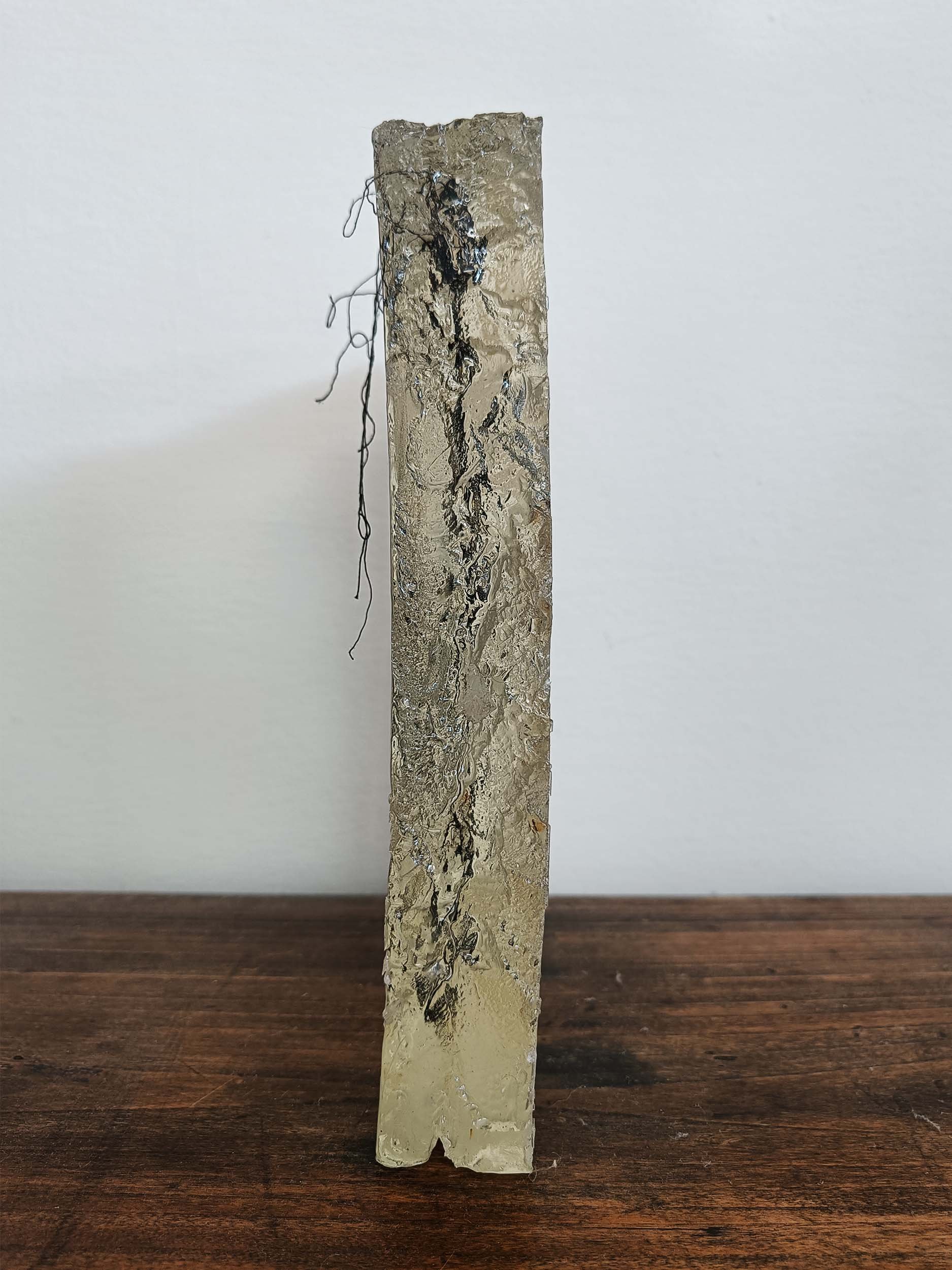 Sculpted epoxy resin with embedded cotton thread embroidery
