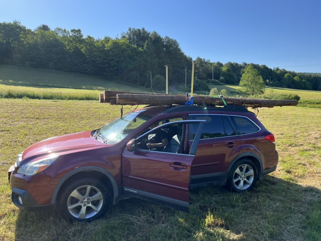 subaru truck with fence posts