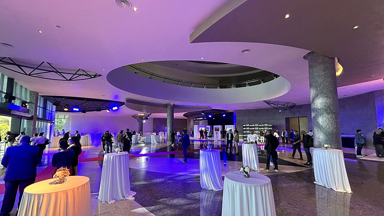The convention centre's flexible foyer and reception space arranged for a formal event, with cocktail tables and feature lighting.