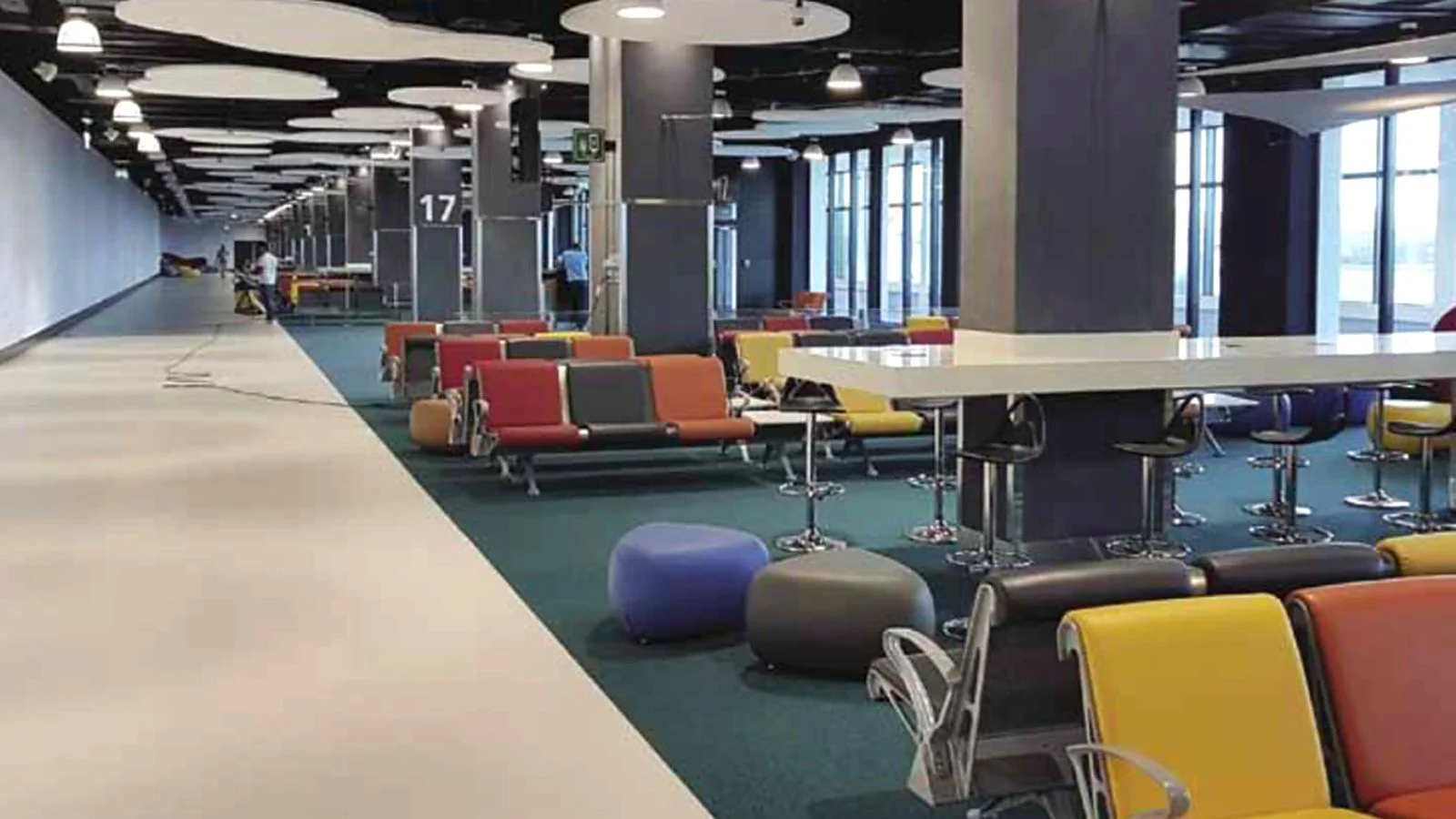 Completed passenger boarding lounge within the refurbished Old Passenger Terminal, showing new seating, circulation space and passenger facilities.