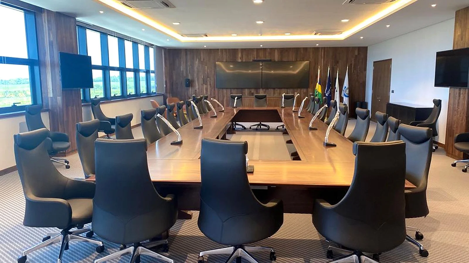 Formal boardroom and meeting facility within the ICCC, equipped for multi-agency coordination and official meetings.
