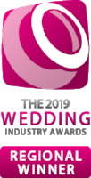 Pink and white logo with a globe icon and the text 'Regional Winner'