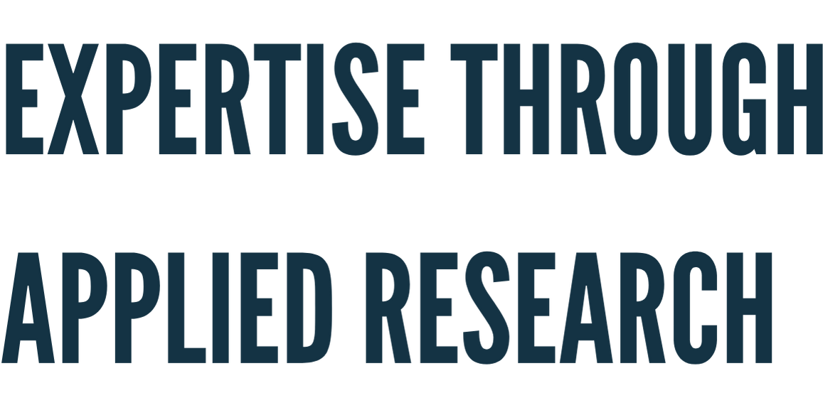 Text in dark blue font that reads "EXPERTISE THROUGH APPLIED RESEARCH" against a white background.