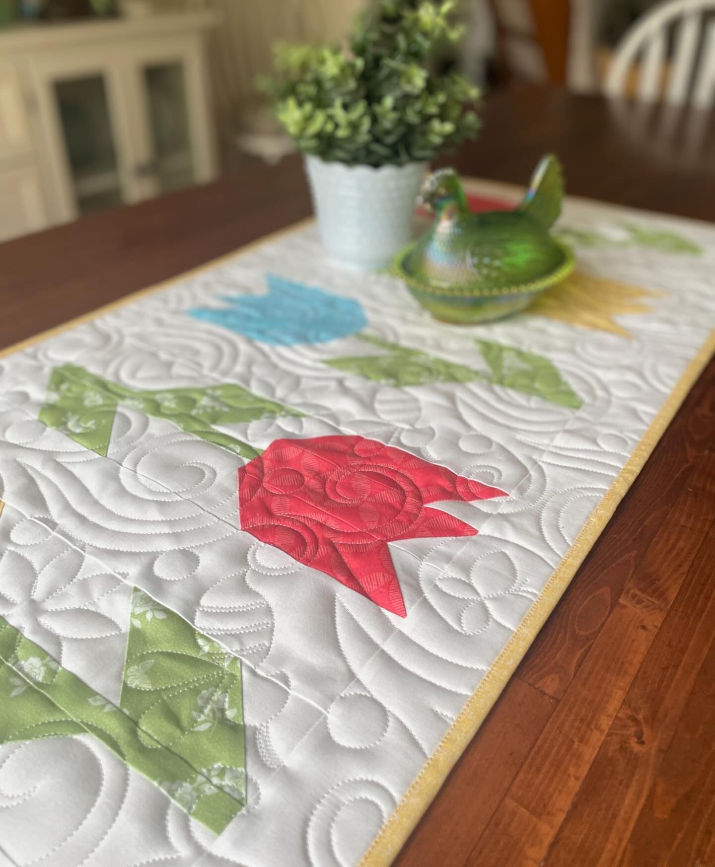 🌷🩵☀️🩵🌷
Be sure to watch my stories today (4/17/24) 

I&rsquo;m having a Spring Special! 

All the details are in a blog post. Link is in stories or in my profile. 😊 

Three more Tulip Time table runners were quilted up! And have I mentioned I&rs