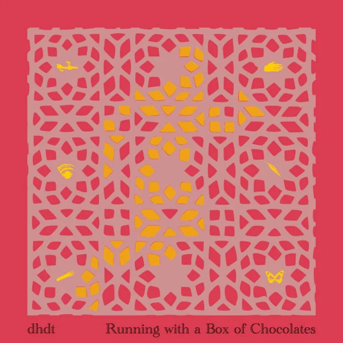 running w a box of choc.jpg