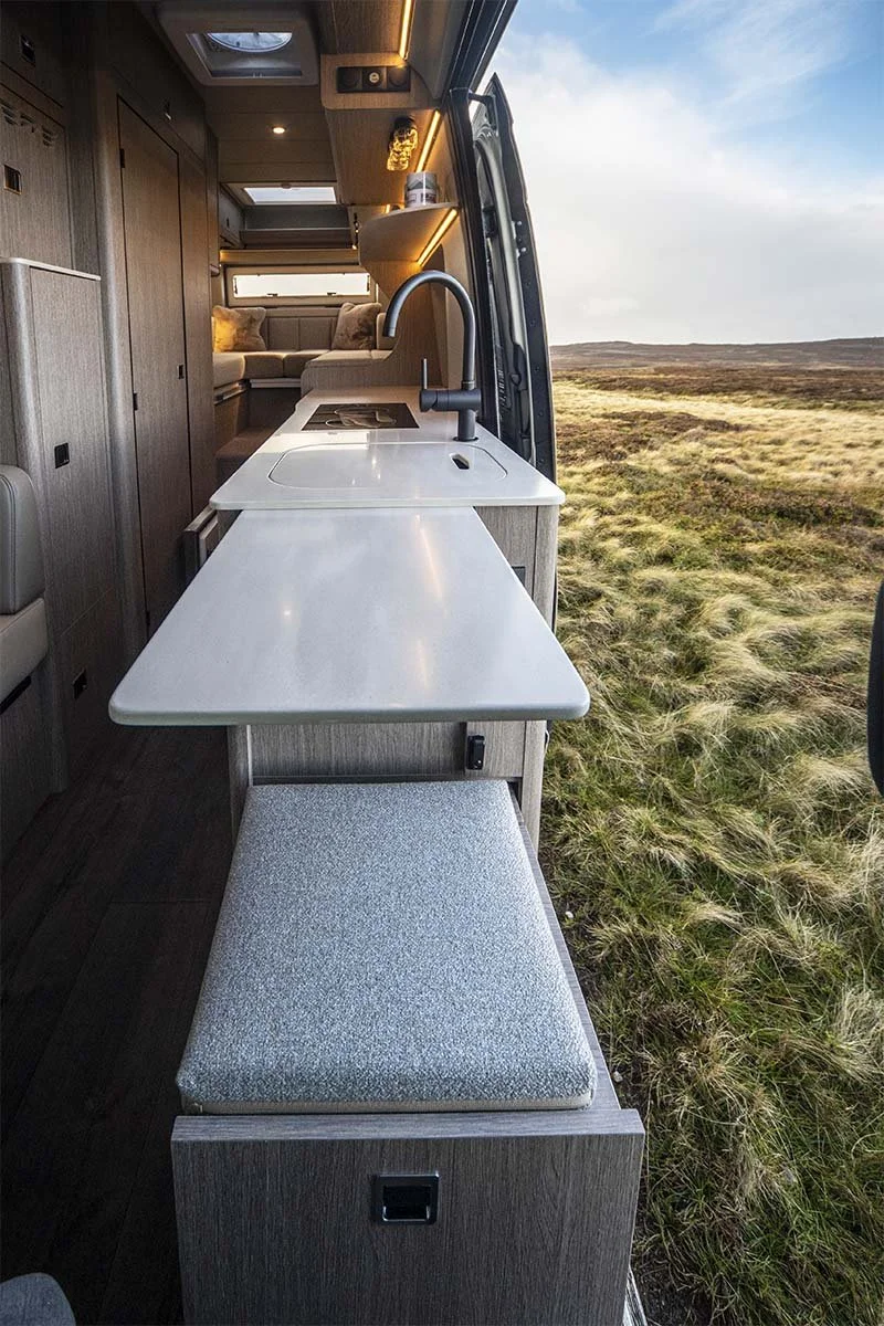 RP rebellion galley kitchen with Corian worktops and dual induction hob