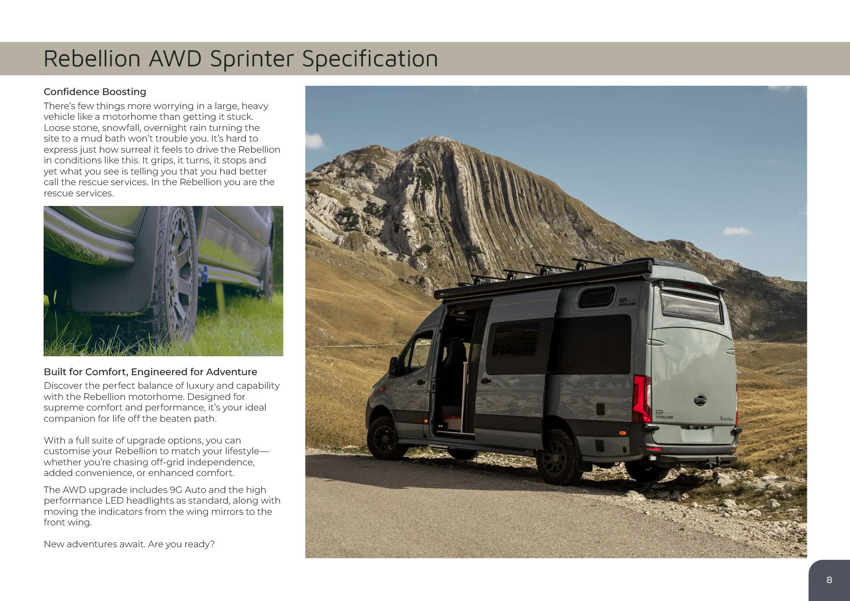 Rebellion AWD Sprinter vehicle parked on a road with mountainous landscape in the background.
