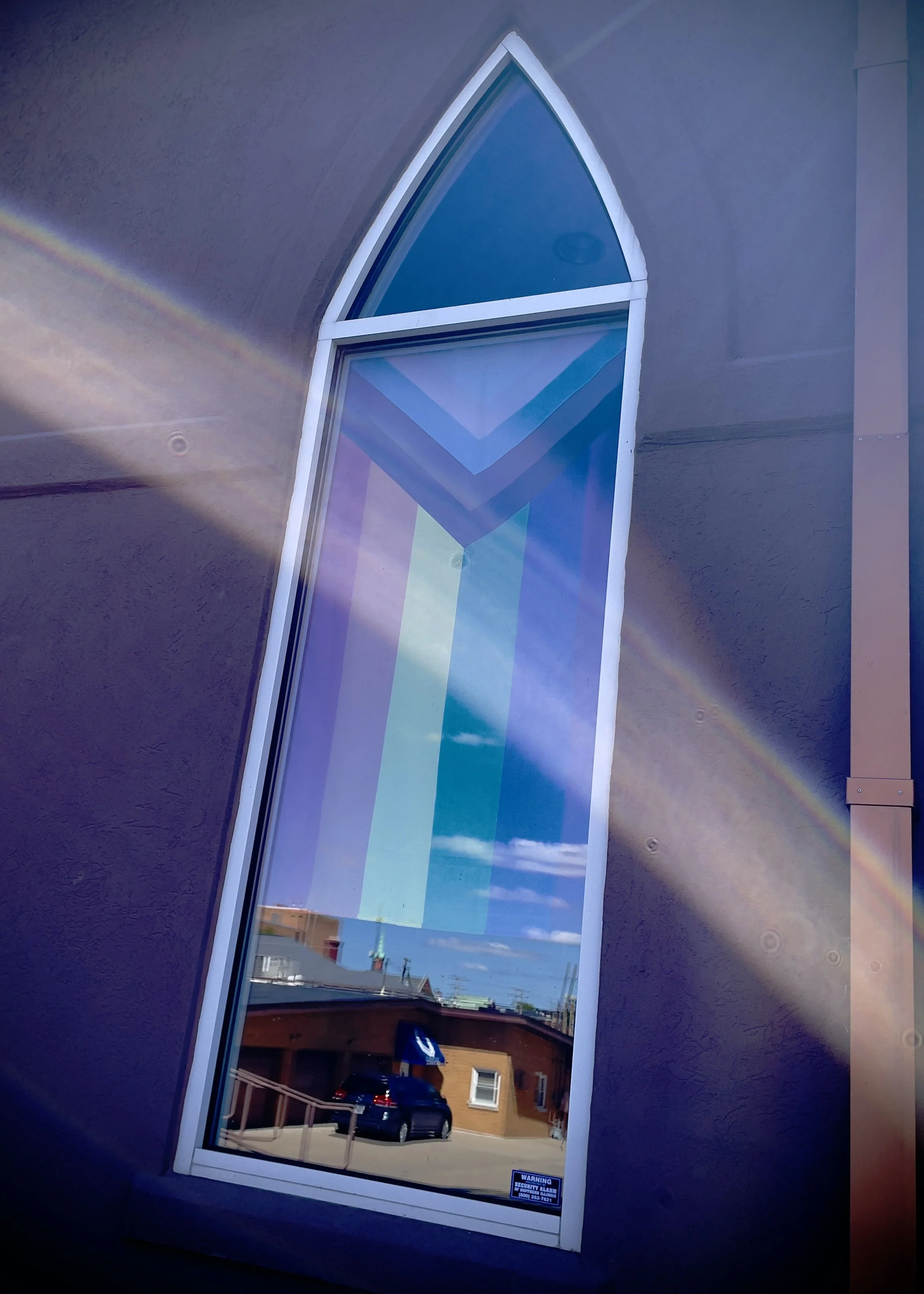 Hollabaugh flag in window.jpg