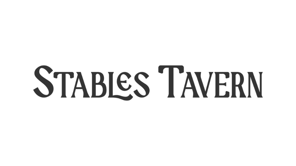 Logo for Stables Tavern in black and white.