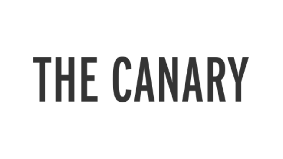 Black background with text that reads 'THE CANARY' in gray letters.