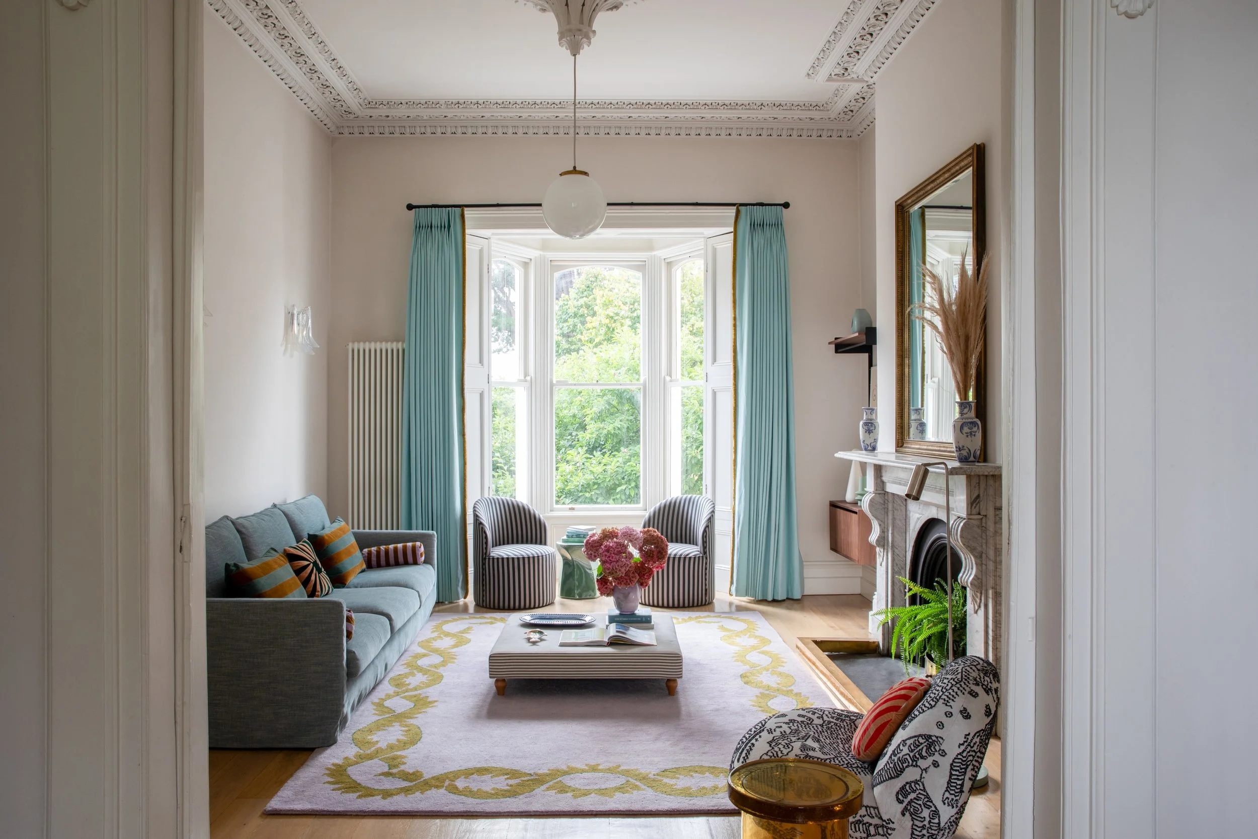 Living room within the Kenilworth Square Project, a Victorian family home renovation in Dublin designed by Porcha Design.