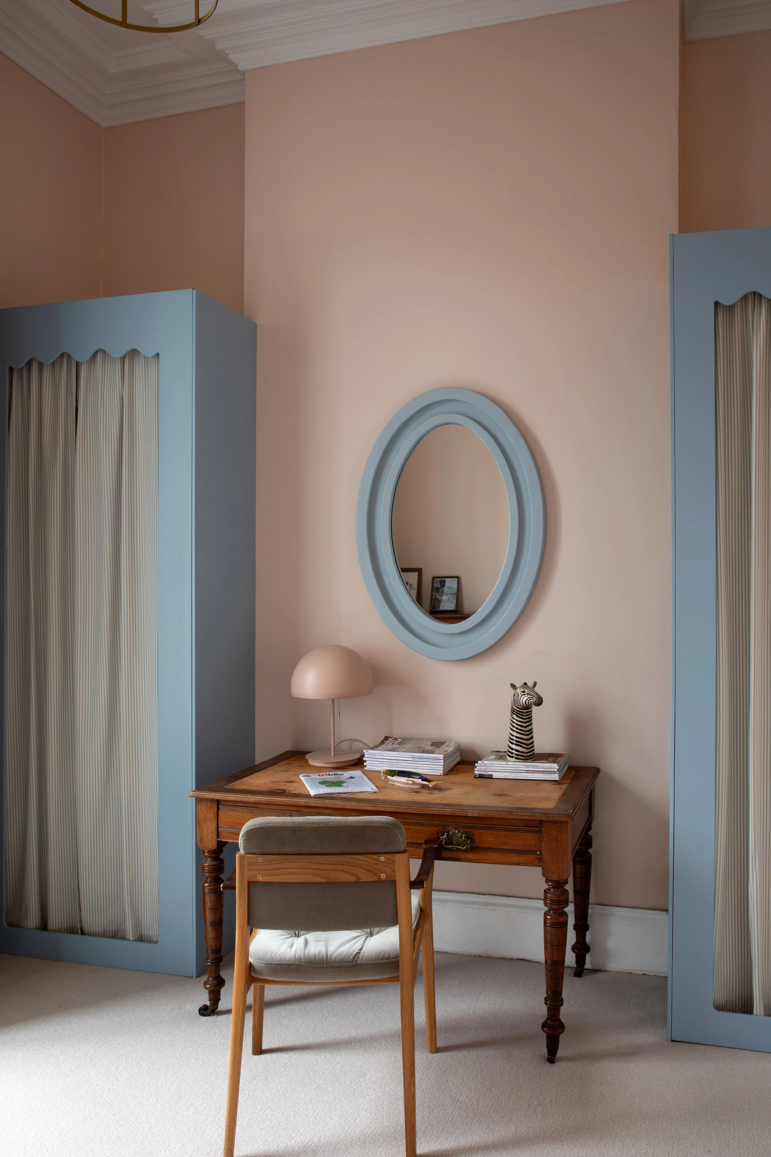 Nursery and work-from-home office with bespoke wardrobe design, fabric-fronted IKEA PAX units and tailored storage solutions in the Kenilworth Square Project, Dublin, by Porcha Design.