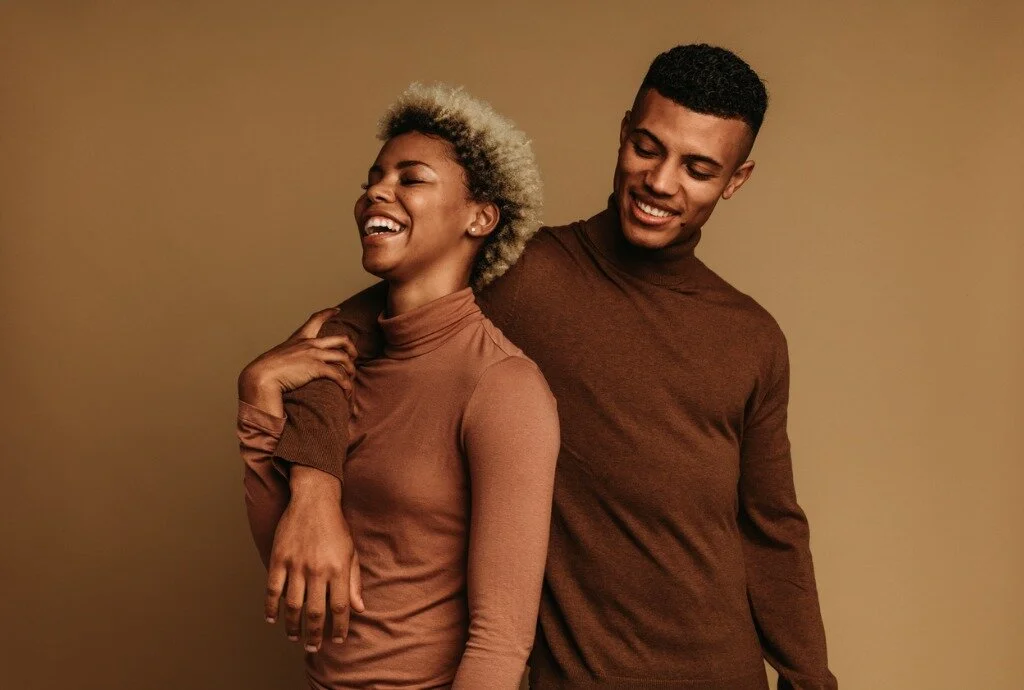 smiling-african-american-man-and-woman-standing-together.jpg_