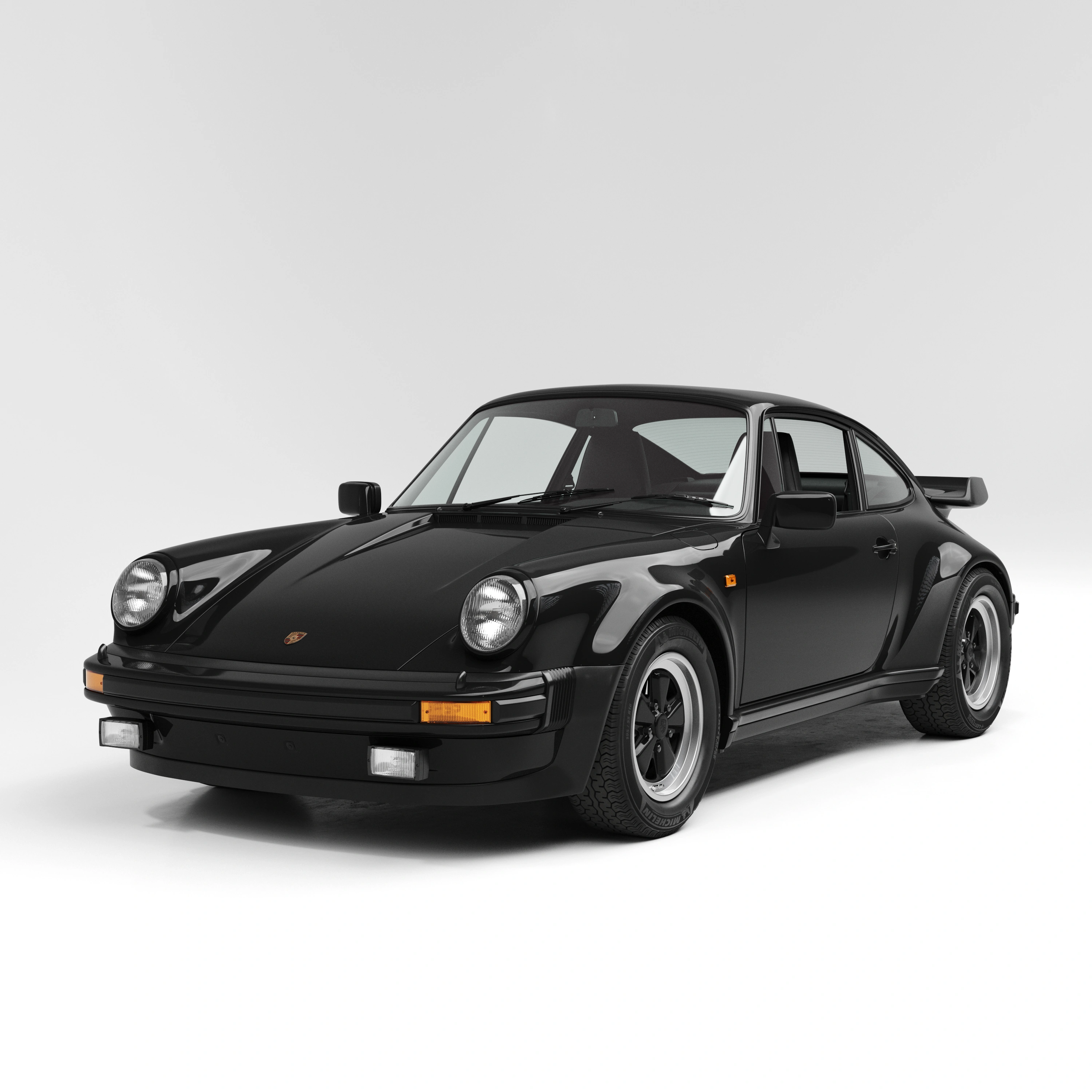 Black Porsche 930 Turbo coupe in studio, front three-quarter view with classic widebody and rear wing