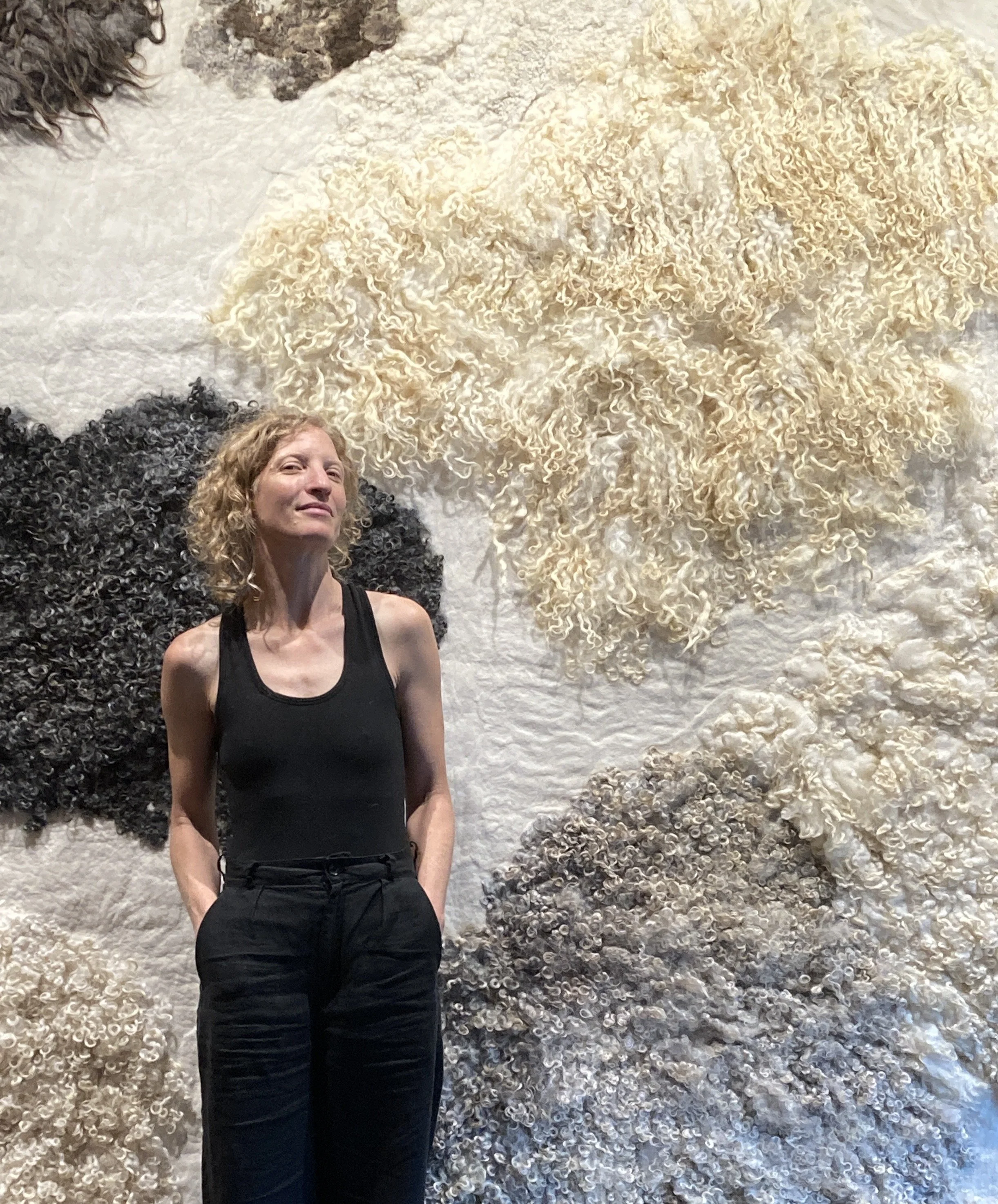  Felt Artist Kristina Foley with the large piece commissioned as part of the permanent exhibit. 