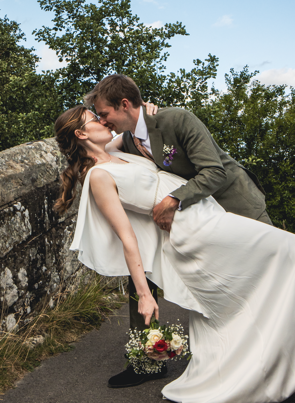 Couple kissing on a bridge near Danby castle