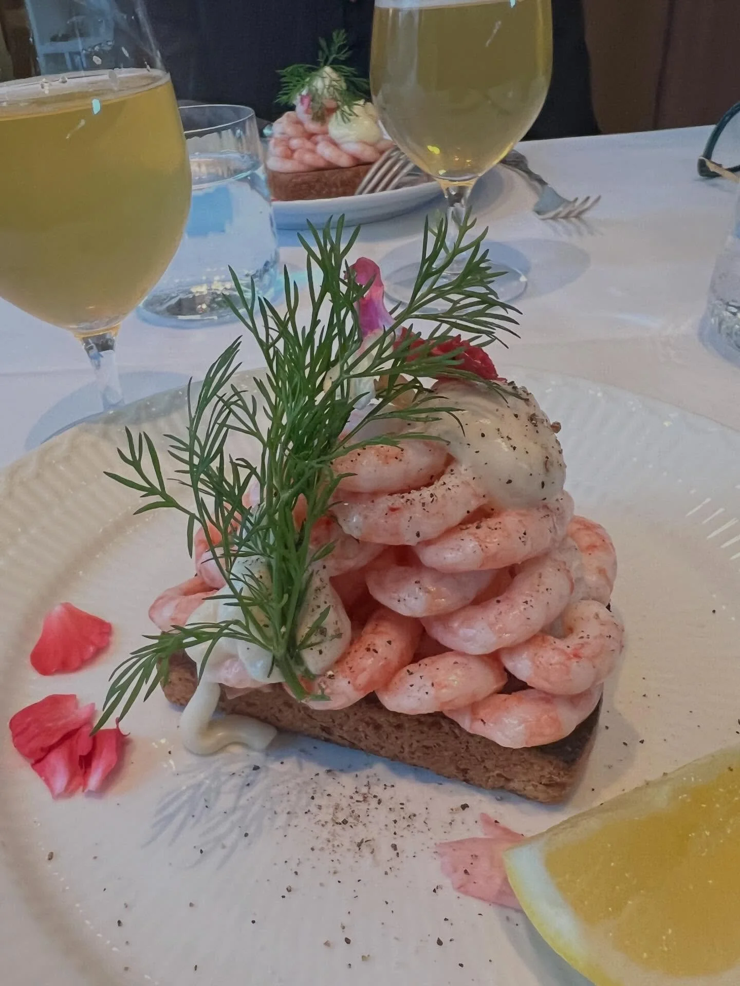 It became summer for a moment amidst the winter snow with this delightful classic Danish &ldquo;rejemad&rdquo; &ndash; a piece of &ldquo;sm&oslash;rrebr&oslash;d&rdquo; topped with shrimp, mayonnaise, dill, and lemon at Restaurant M&oslash;ntergade.
