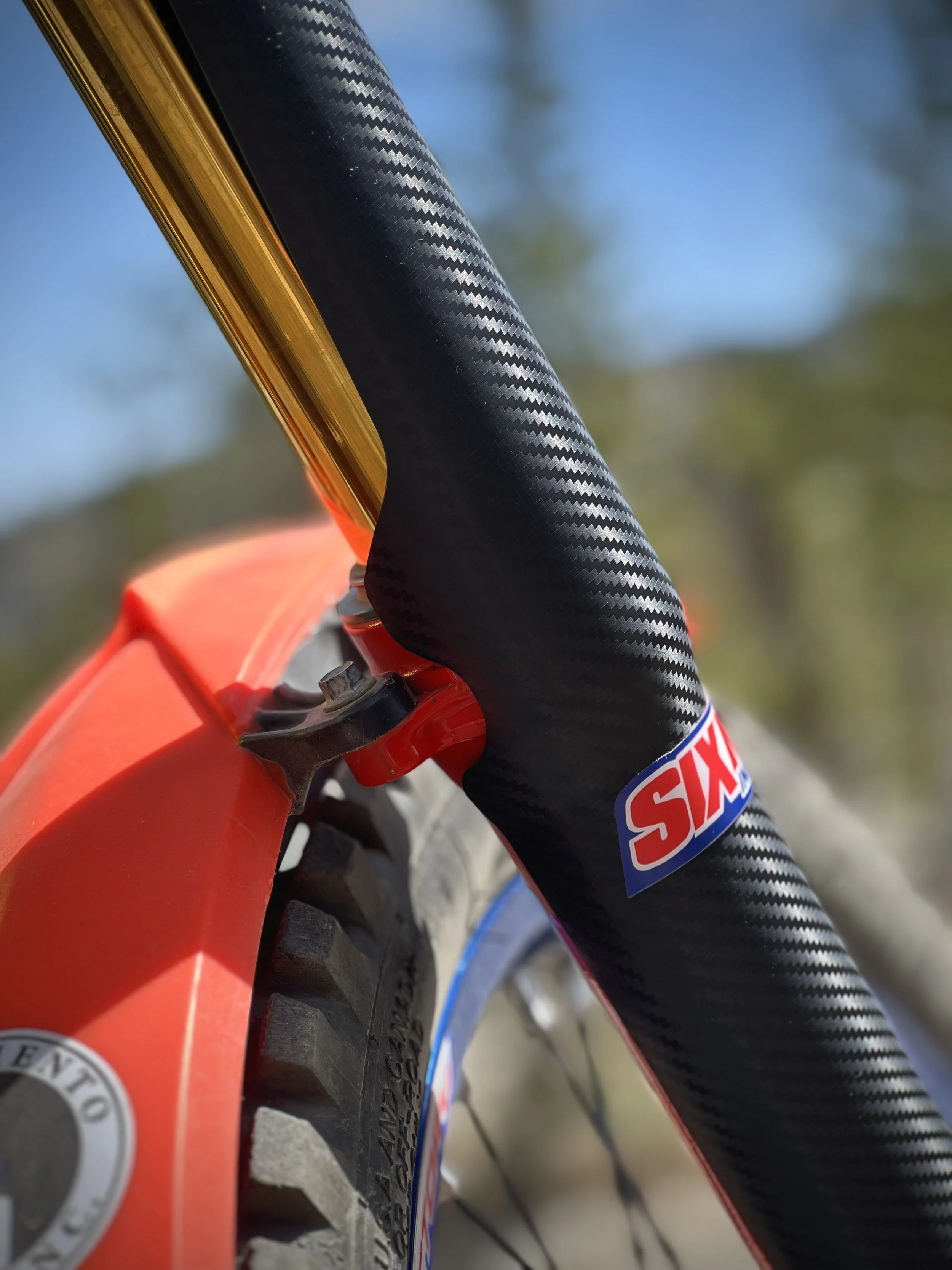 Carbon look tall boys closeup on Beta