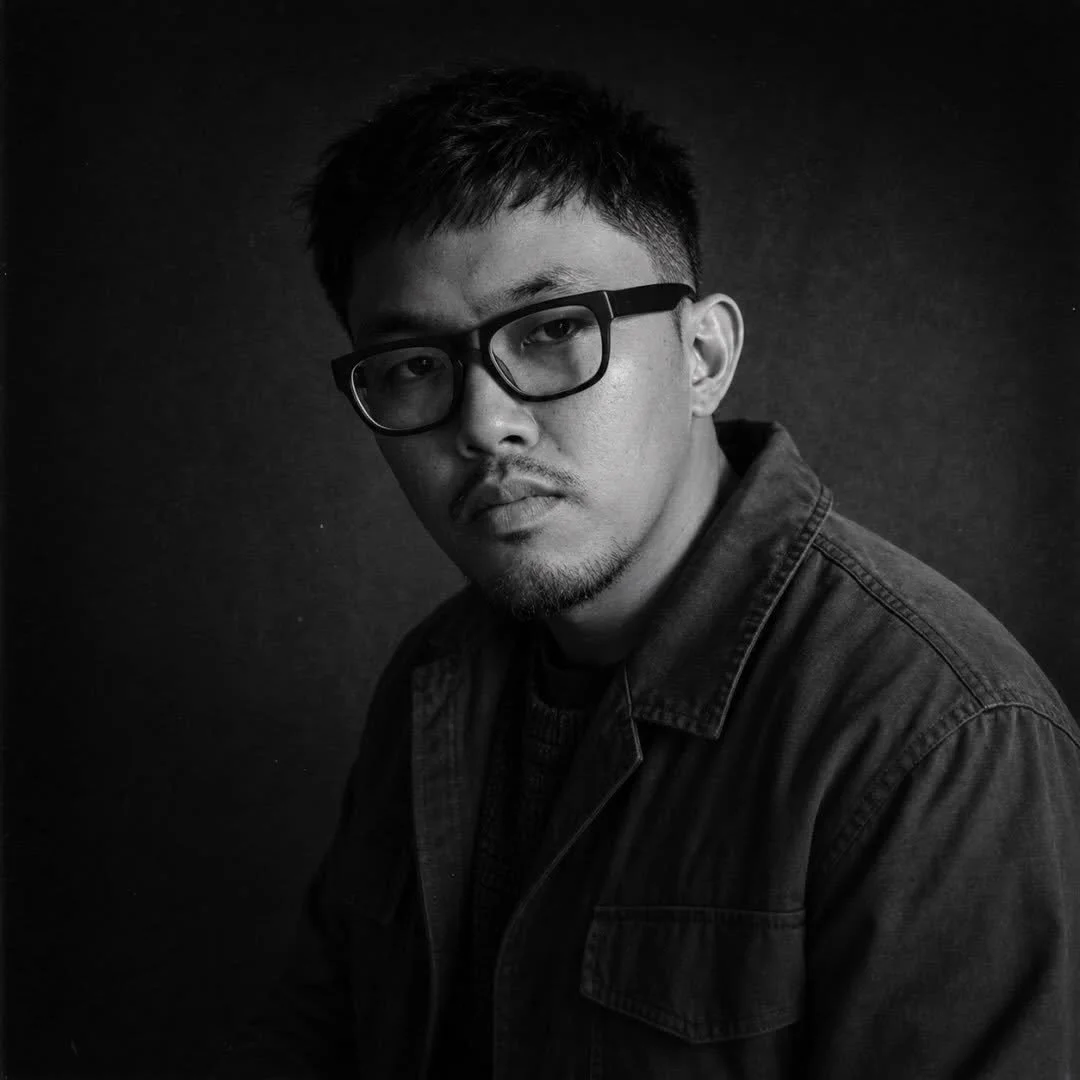Black-and-white portrait of Kevin Oliver Arota, video editor and filmmaker