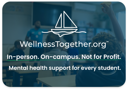 A promotional banner for WellnessTogether.org showing a classroom with a teacher and students, emphasizing in-person, on-campus mental health support for students, not for profit.