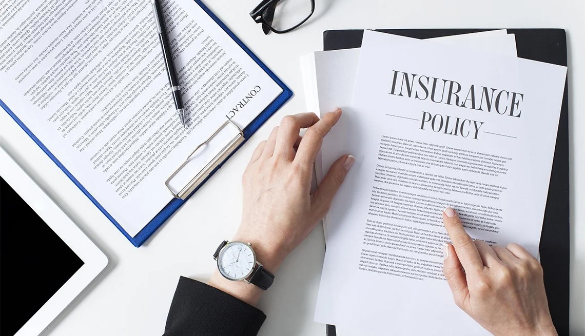 1140-woman-reading-insurance-policy.jpg
