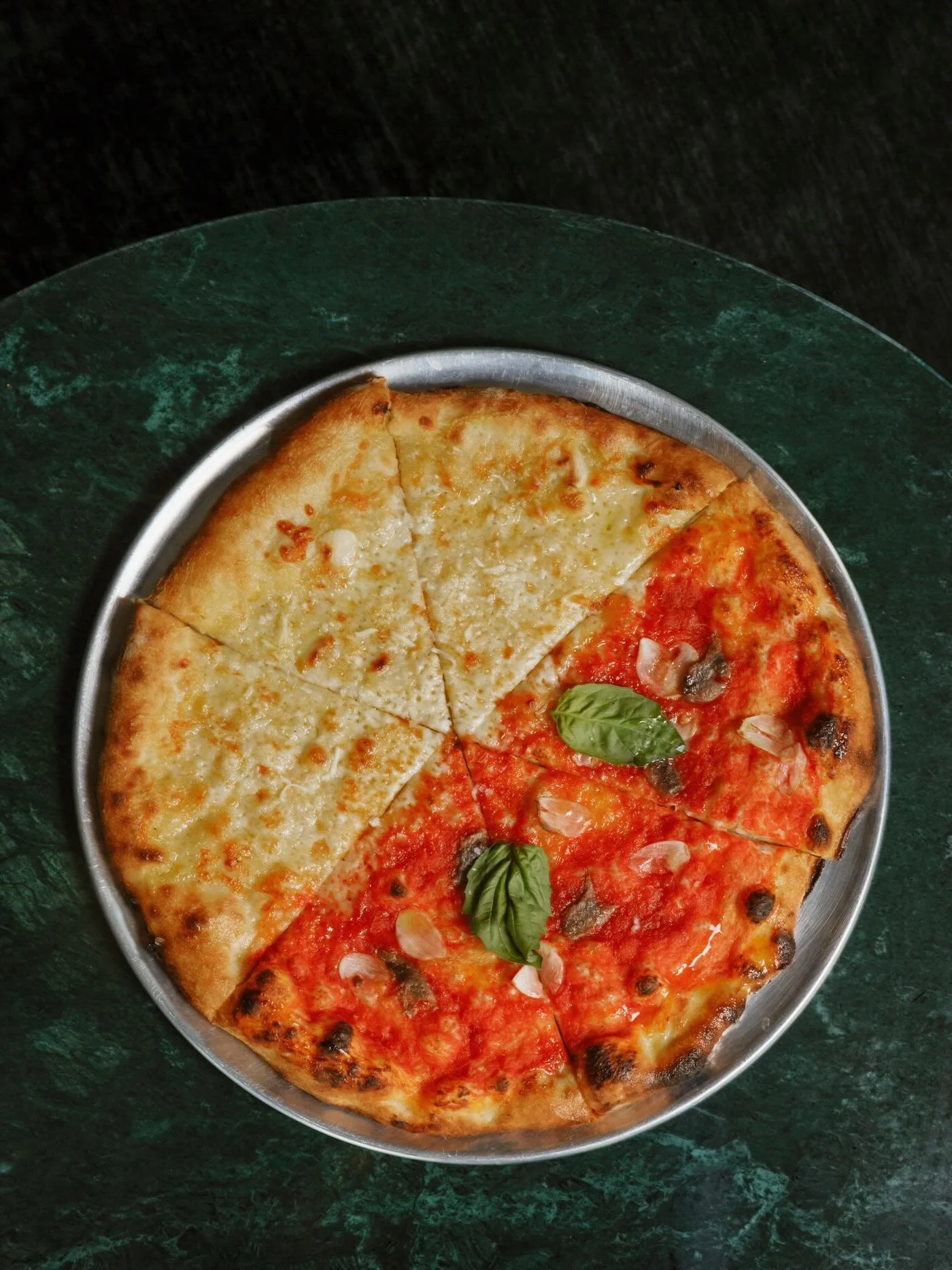 a defining element at @maisonmassilia is the pizza menu curated by ines glaser of @lupacotta .

highlights include the moiti&eacute; moiti&eacute;, half four cheese &amp; half marinara with cantabrian anchovies, a cult classic found on marseille pizz