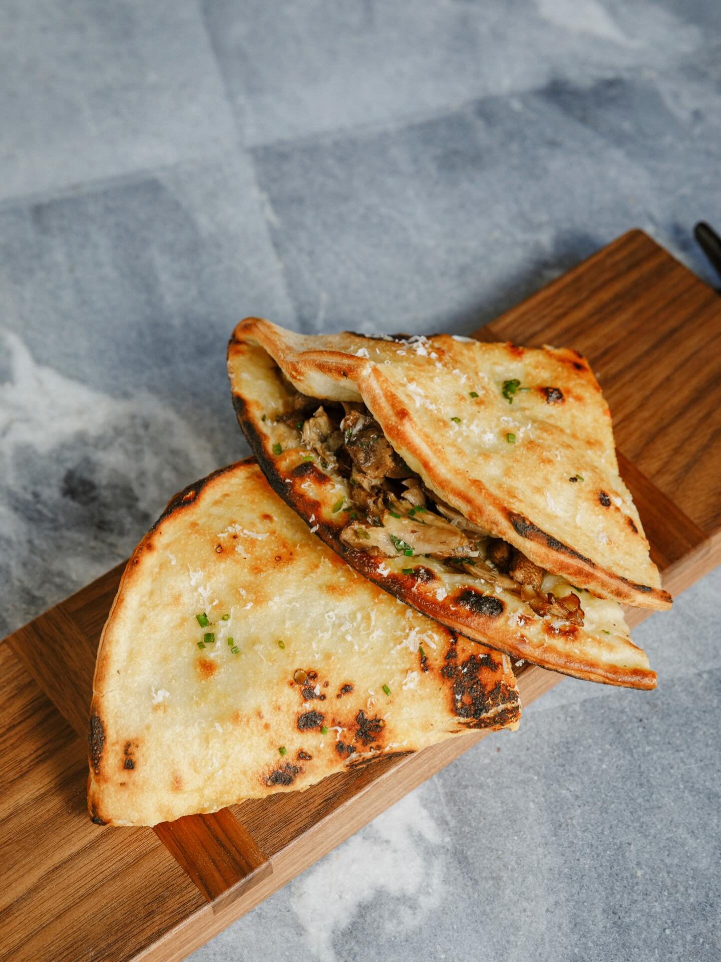mushrooms pizza sandwich with brie, garlic butter &amp; pine nuts
#massilia #dtla