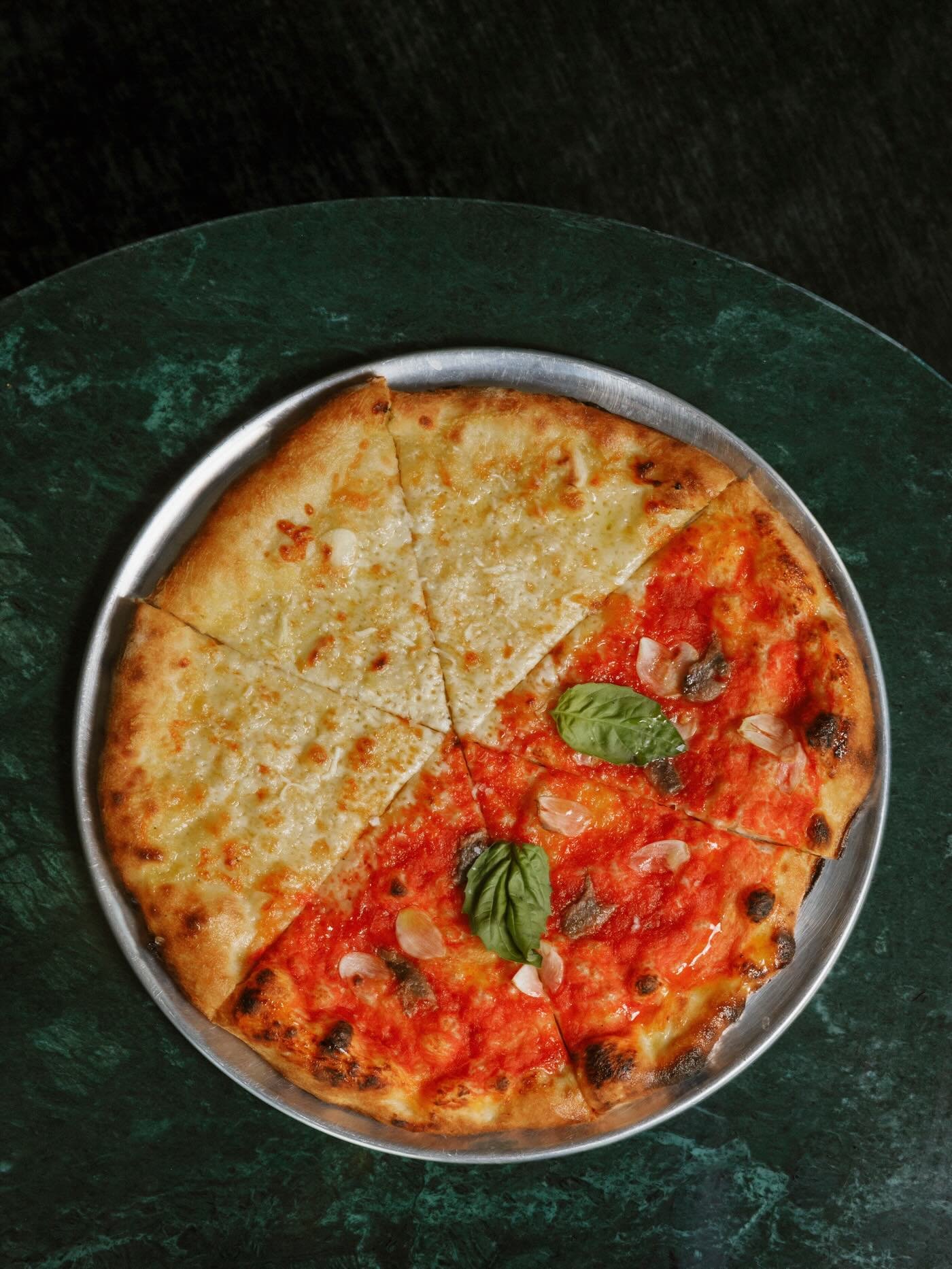 a defining element at @maisonmassilia is the pizza menu curated by ines glaser of @lupacotta .

highlights include the moiti&eacute; moiti&eacute;, half four cheese &amp; half marinara with cantabrian anchovies, a cult classic found on marseille pizz