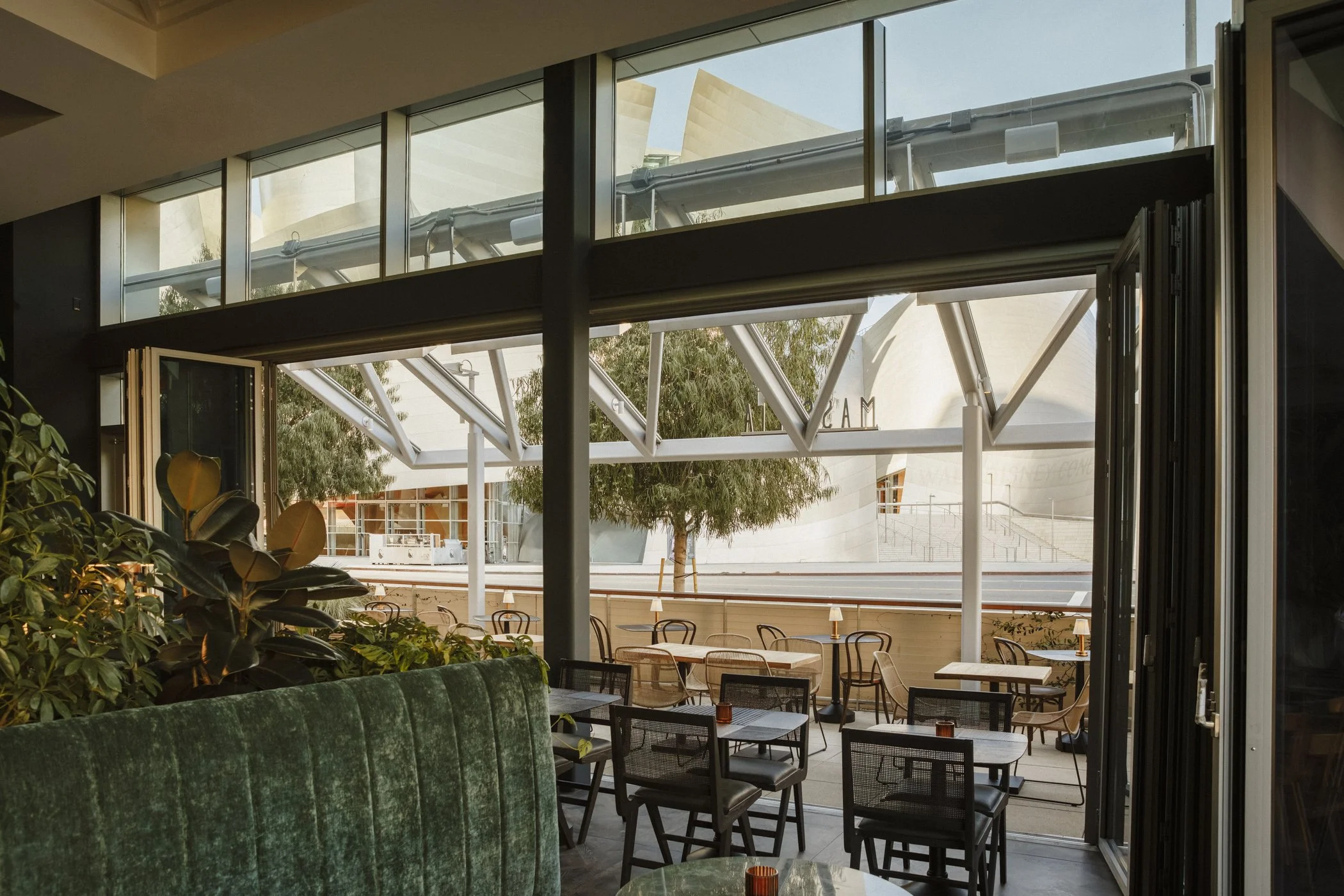 Photo of outdoor patio facing Walt Disney Concert Hall at Massilia Grand DTLA, a French-Mediterranean restaurant