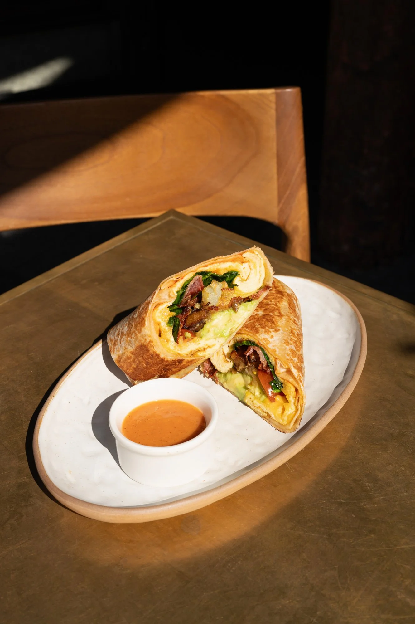 Photo of bacon & crispy potatoes breakfast burrito at Massilia, a French-Mediterranean restaurant