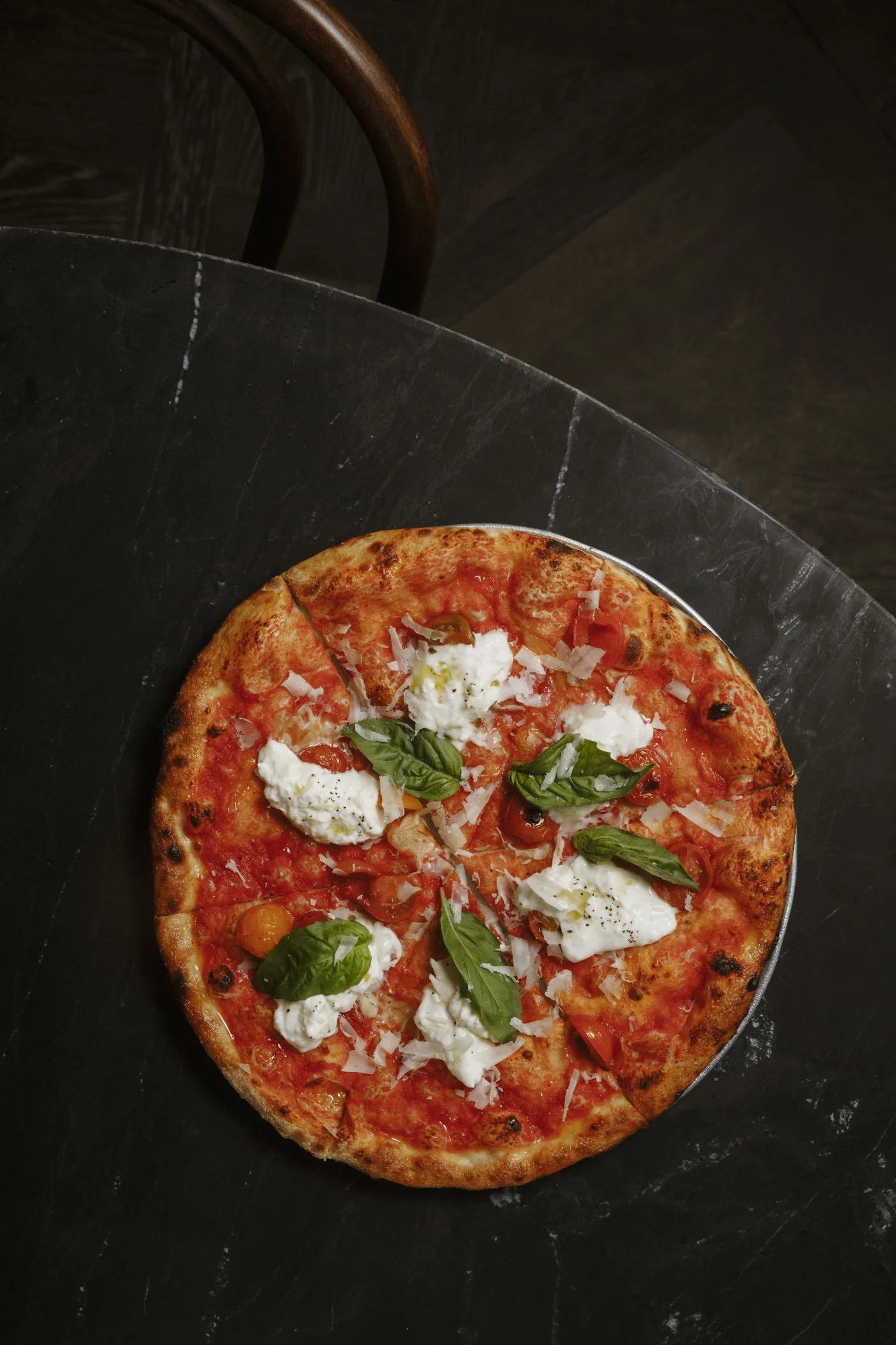 Photo of burrata margherita pizza at Massilia, a French-Mediterranean restaurant