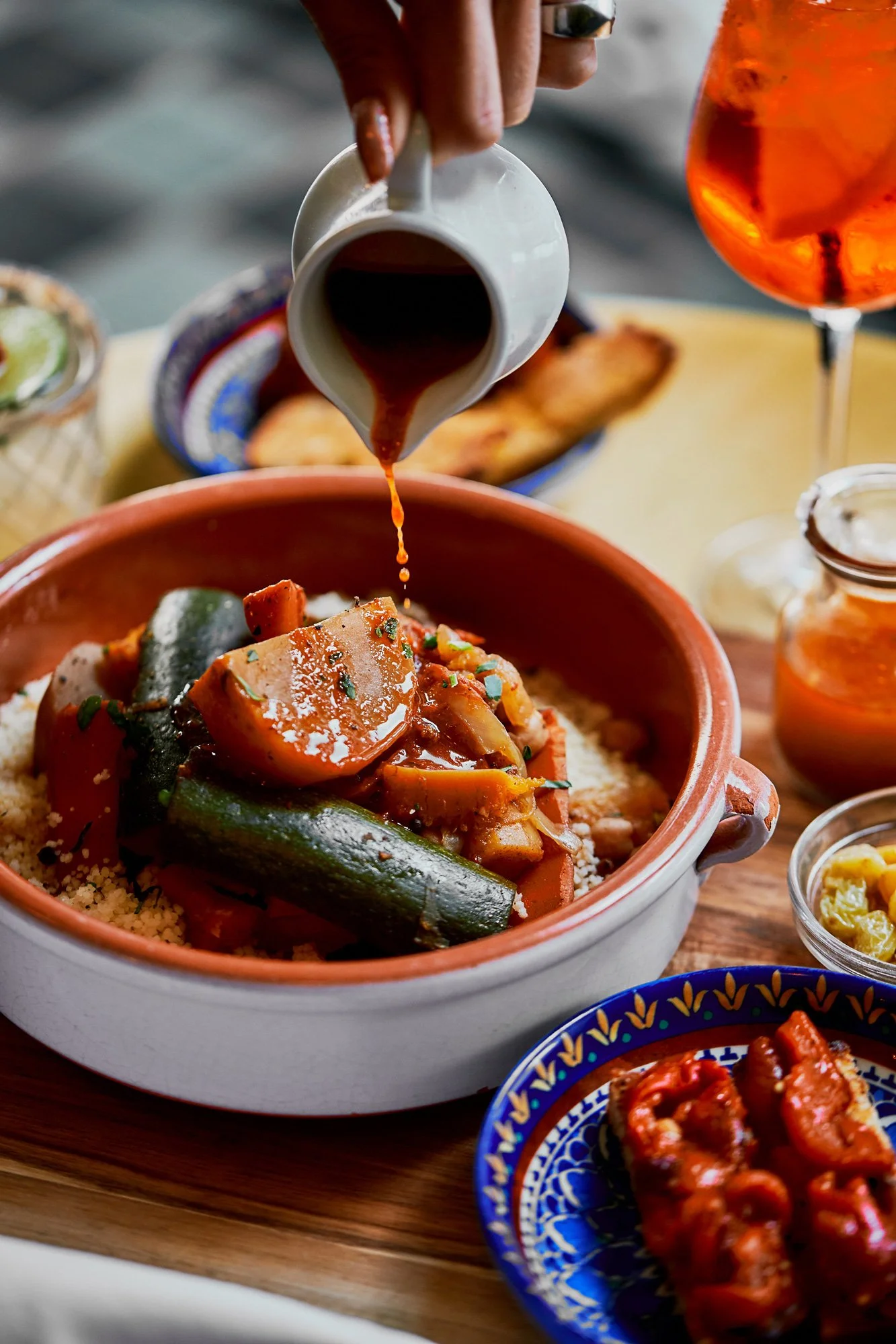 Photo of seven vegetables couscous tajine at Massilia, a French-Mediterranean restaurant