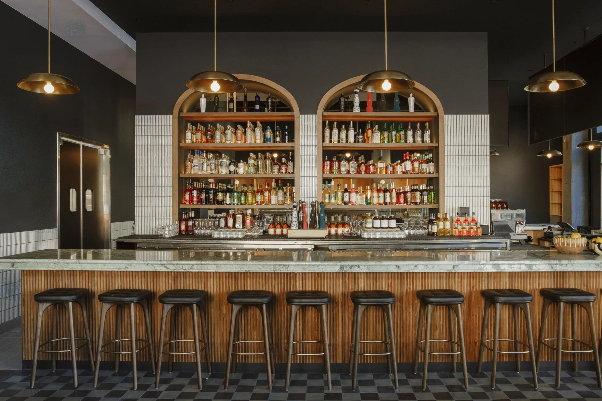 Photo of full bar at Massilia Grand DTLA, a French-Mediterranean restaurant