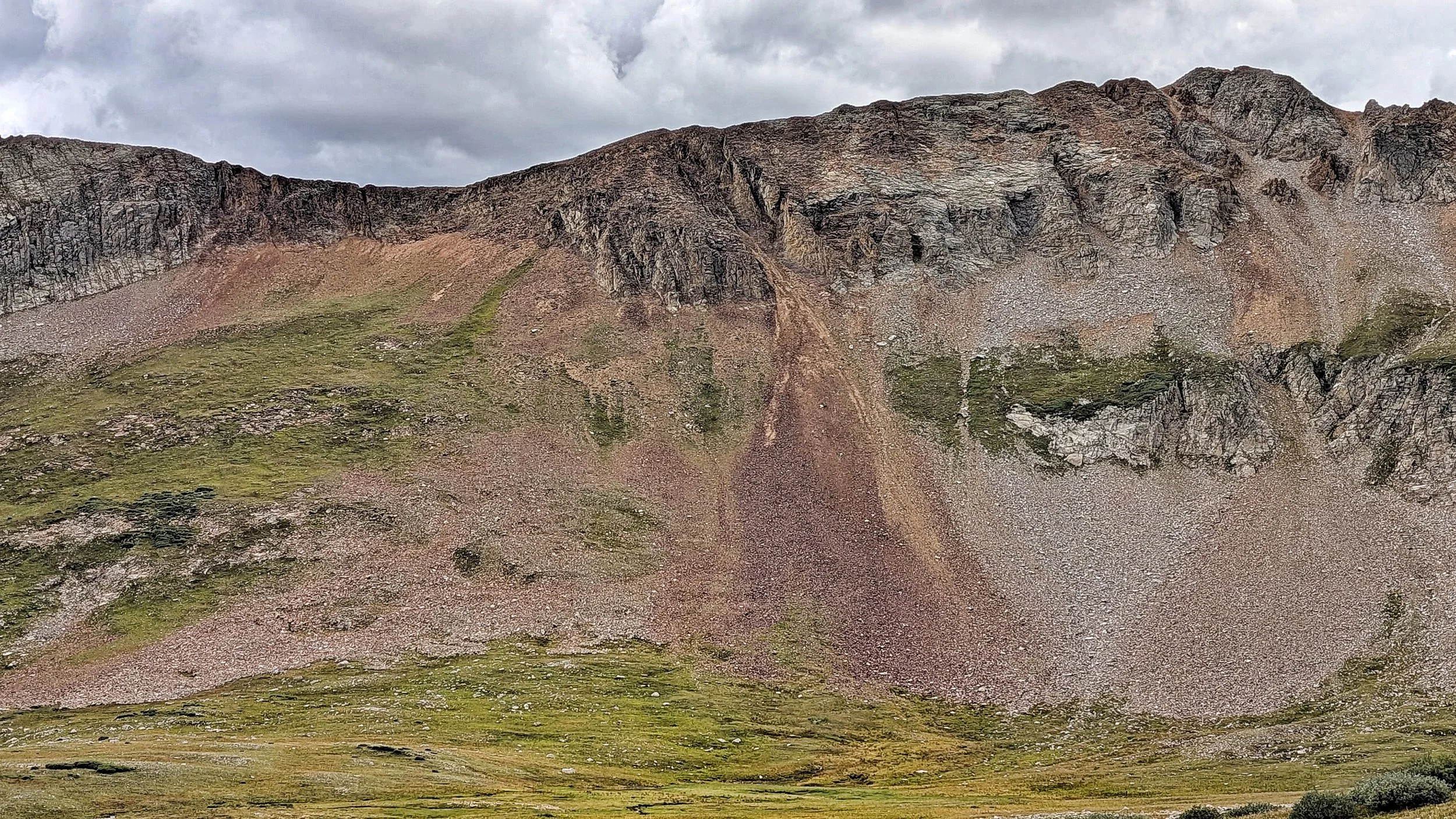The slope and cliffs to gain the upper ridge on "V9"