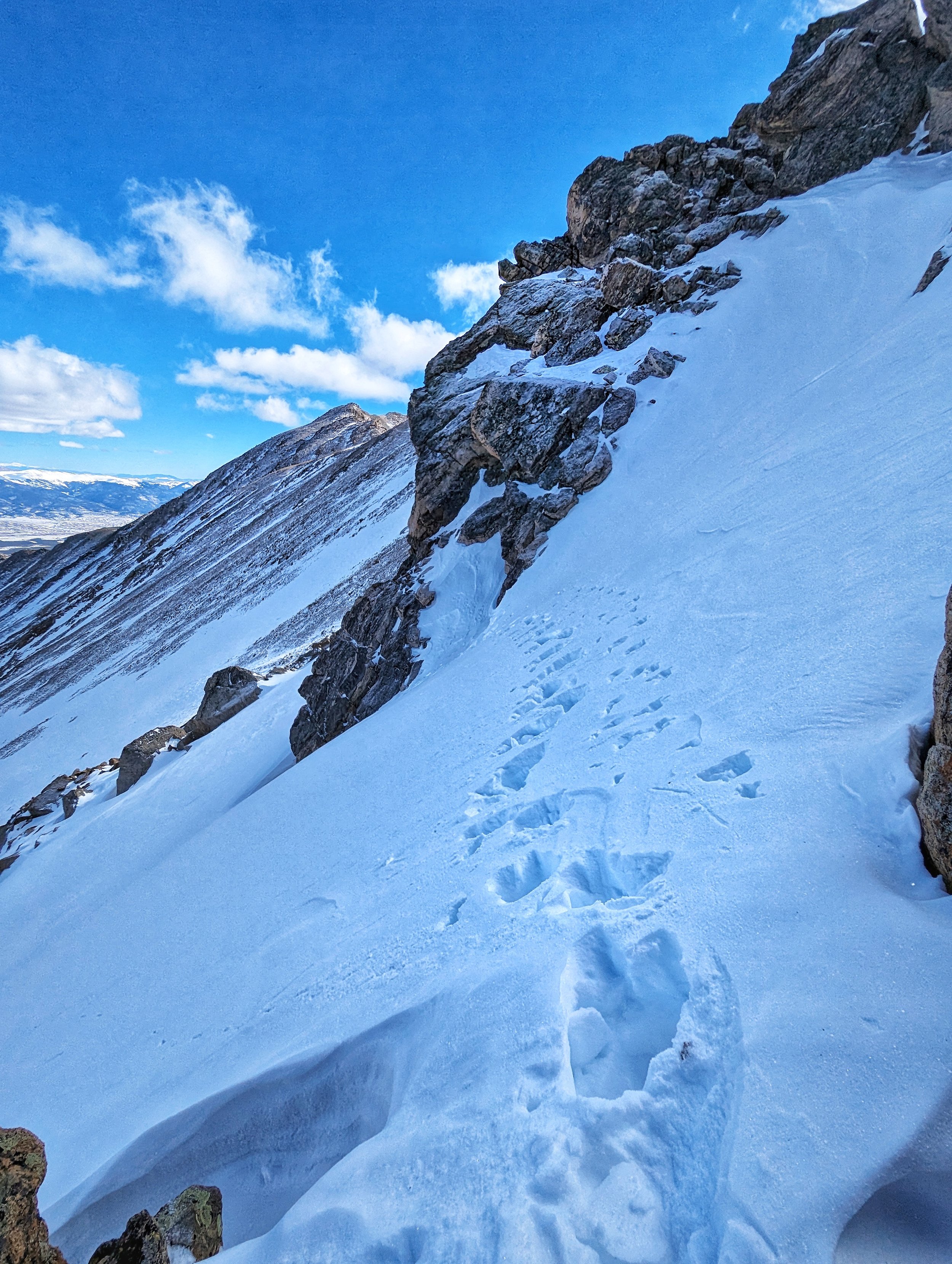 A sketch snow crossing on the traverse to North Massive
