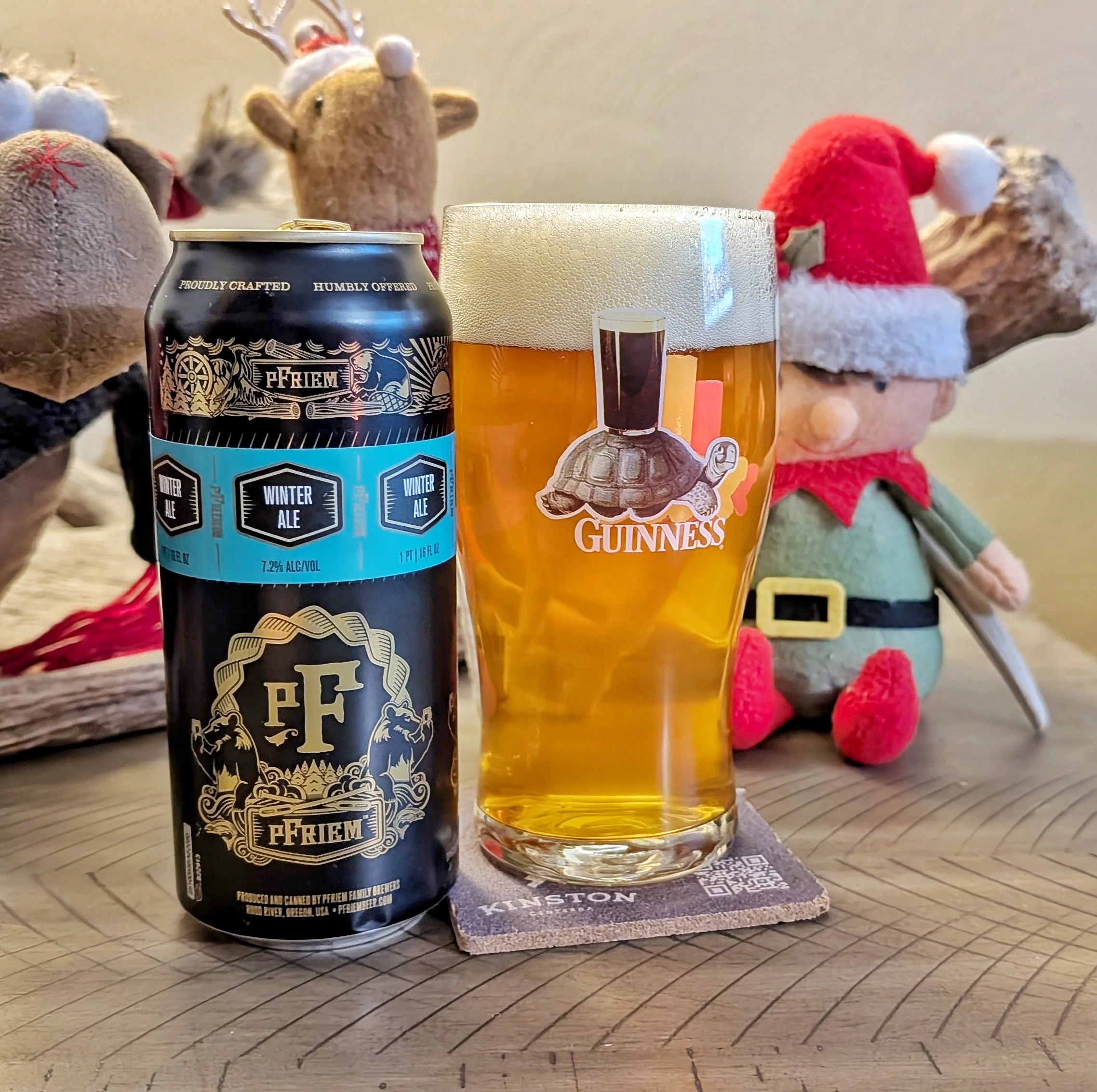 'Elf on a table' drinking a Winter Ale by pFriem.  