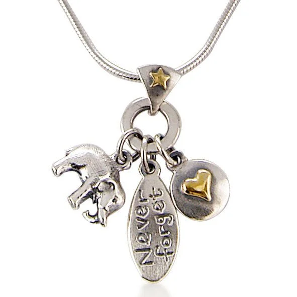 Silver necklace with three charms: a horse head, an oval tag engraved with "Never forget", and a round charm with a gold heart.