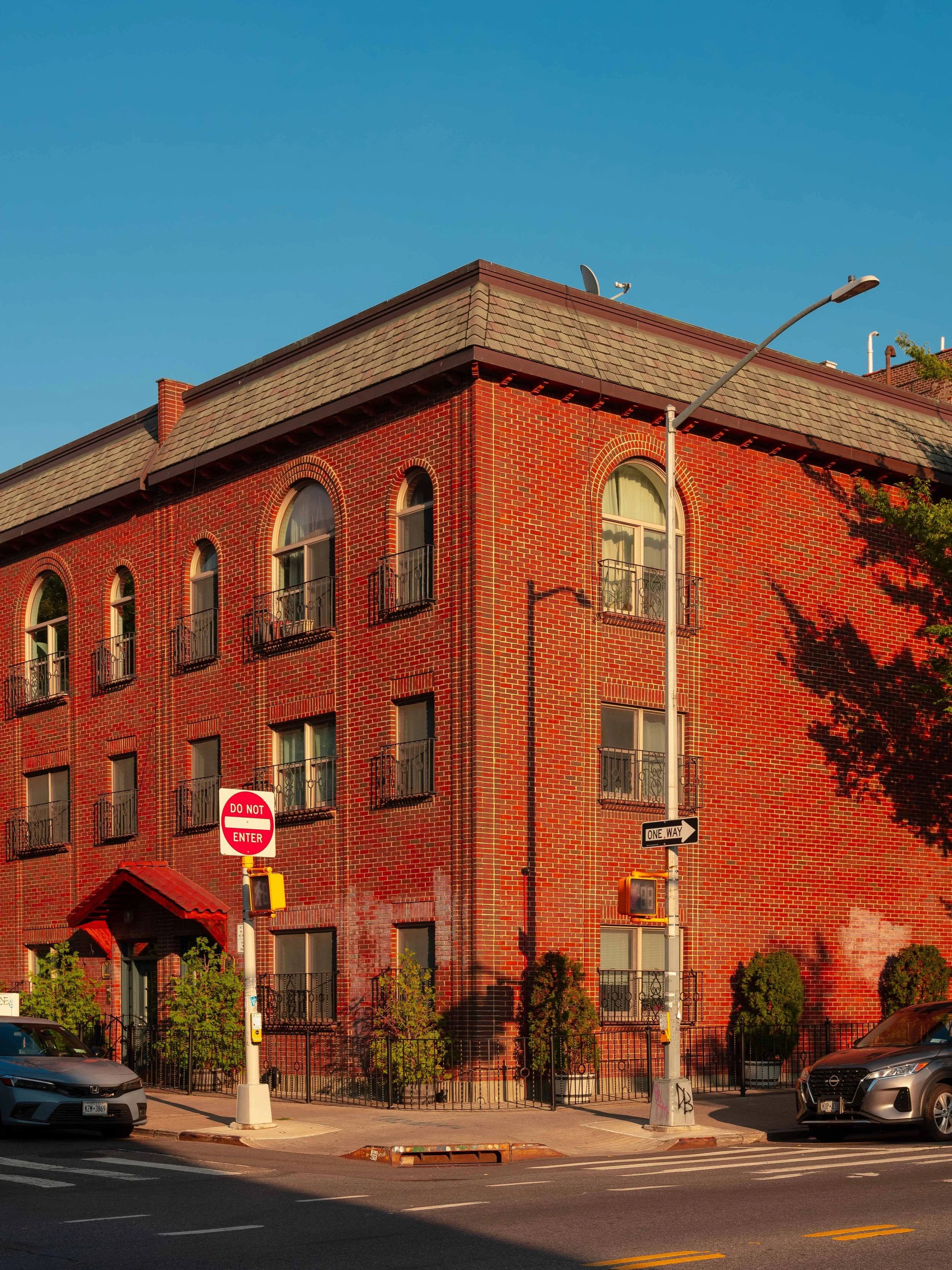 SJC_Sunset Slapping a building.jpg