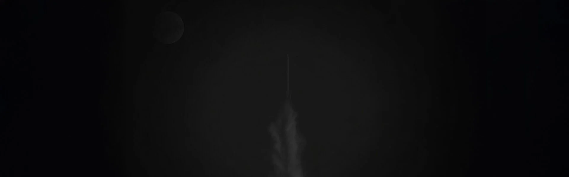 Rocket lifting off into night sky, evoking a milestone that needs credibility to be believed