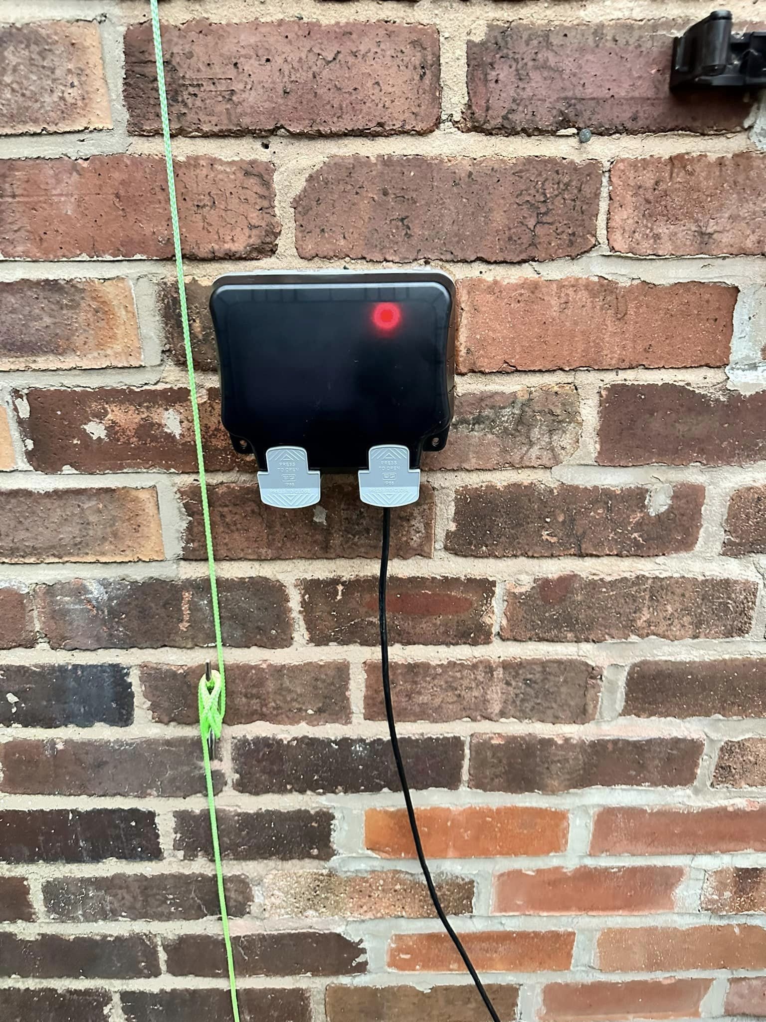 Outdoor storm proof socket