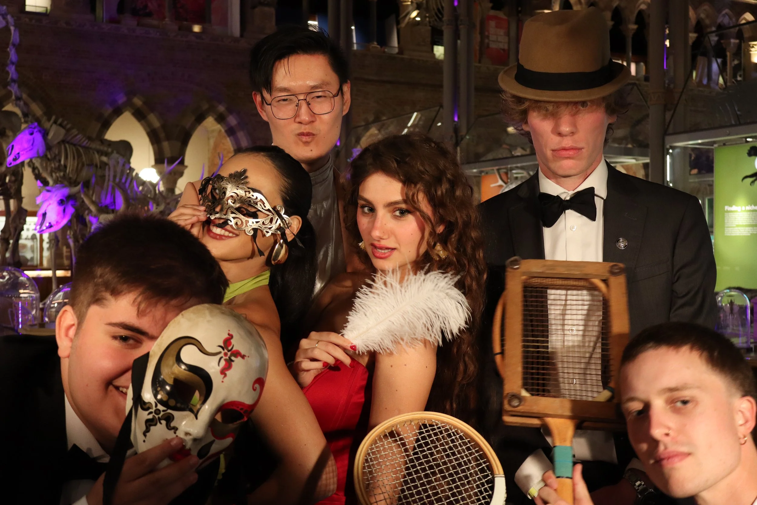 Antique photo booth with vintage props at a wedding