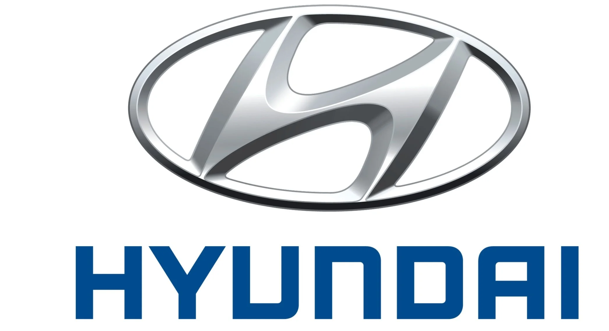 Logo Hyundai con lettera H stilizzata in un ovale, testo "HYUNDAI" in blu.