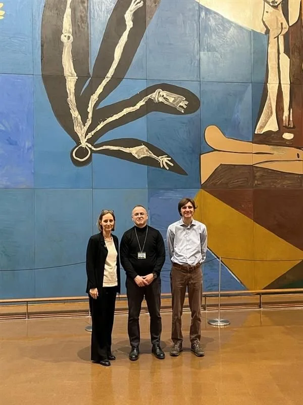 IAU Secretary General Hilligje van't Land,  Yasar Kondakci, and Giorgio Marinoni at UNESCO Headquarters