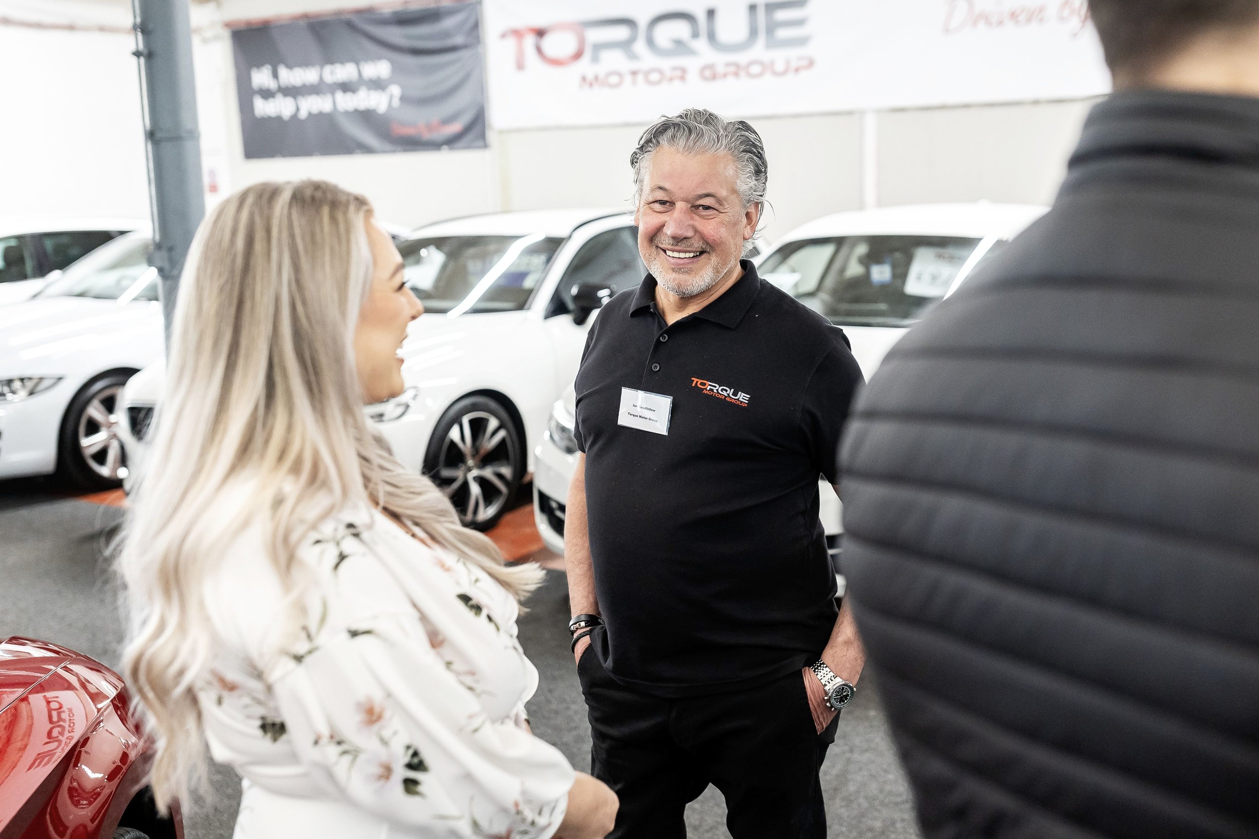 Candid photography of business owners chatting at a West Yorkshire networking event