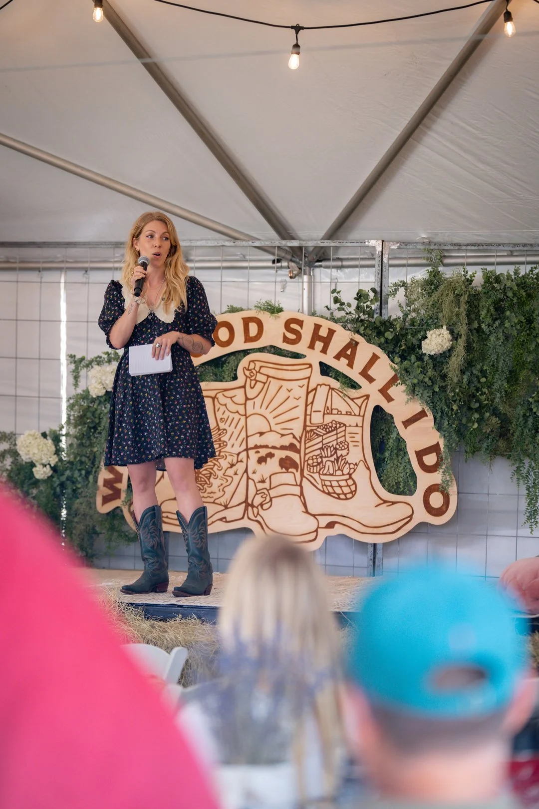 Sarah leading a lecture at a wellness conference.