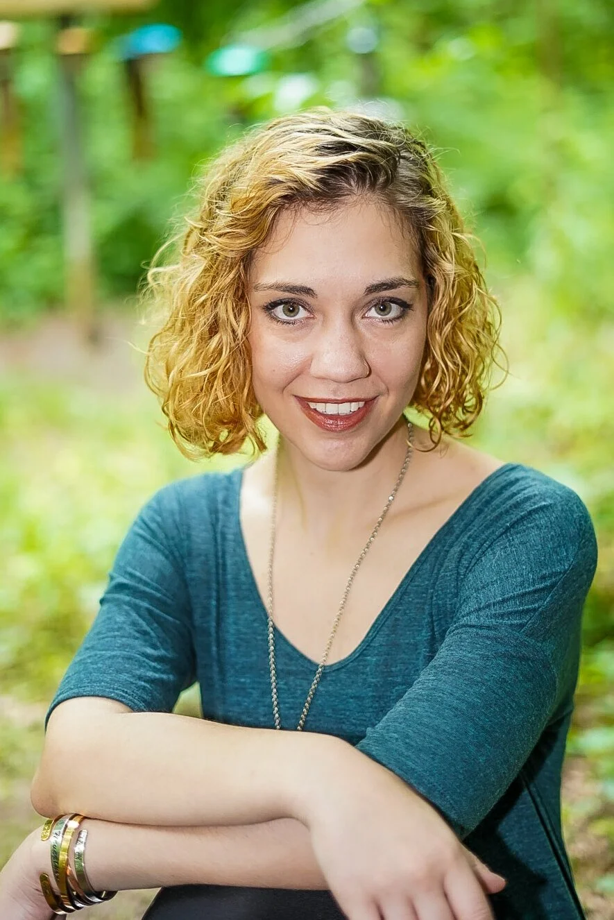 Emma Faulkner smiles at the camera