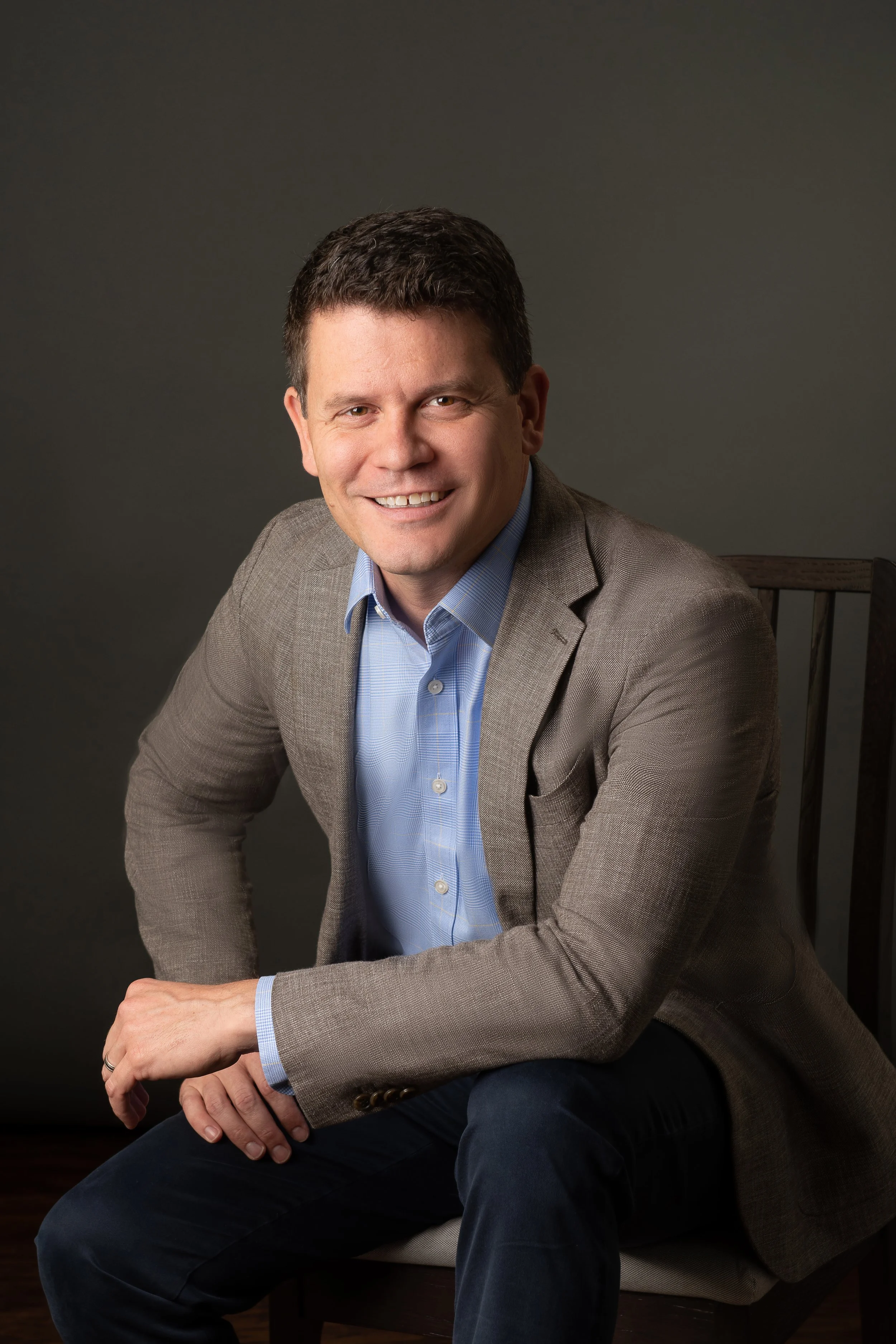 Professional Headshots Winter Park Man seated