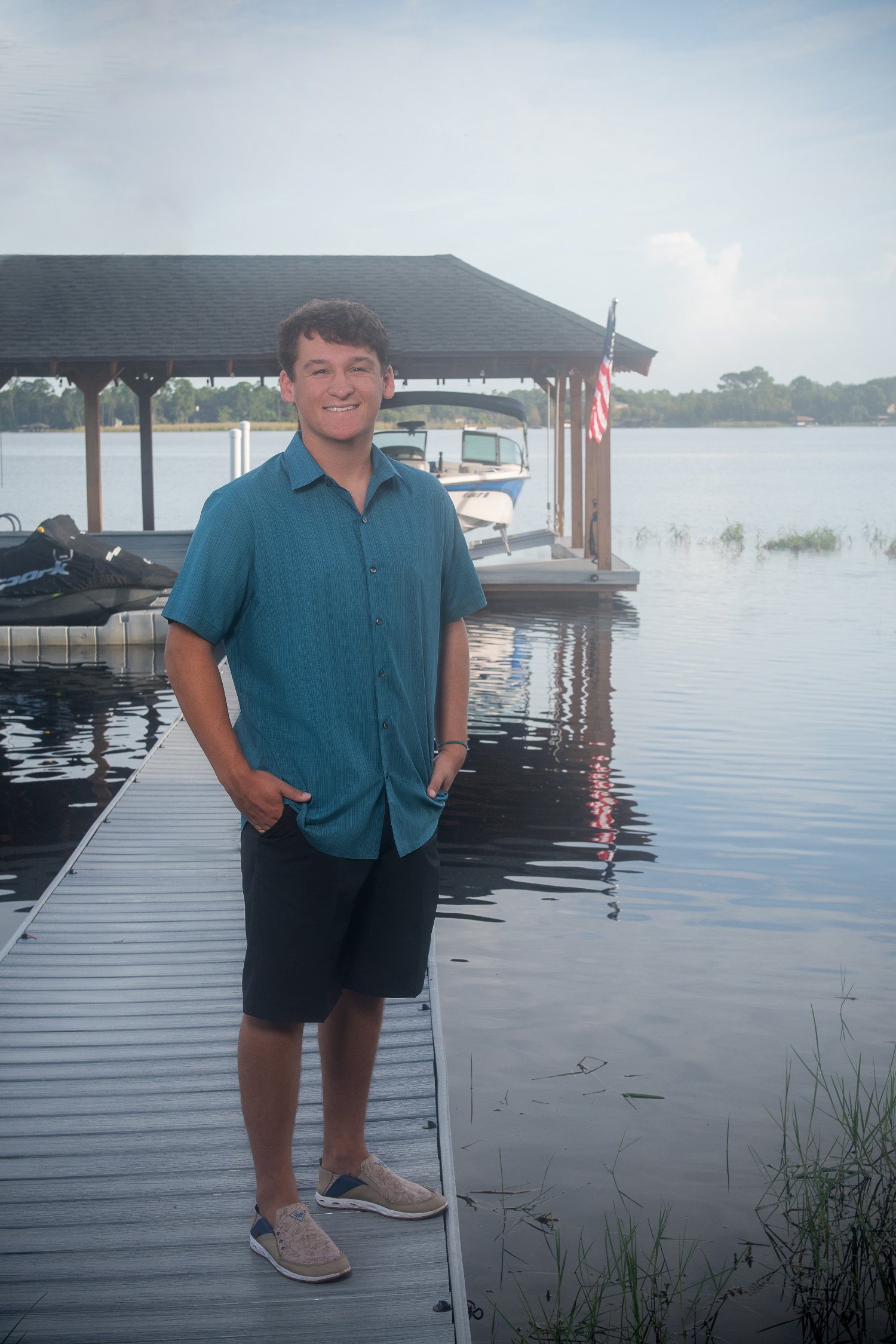 Florida Teen posing on dock Senior Year Experience Apopka FL (Copy)