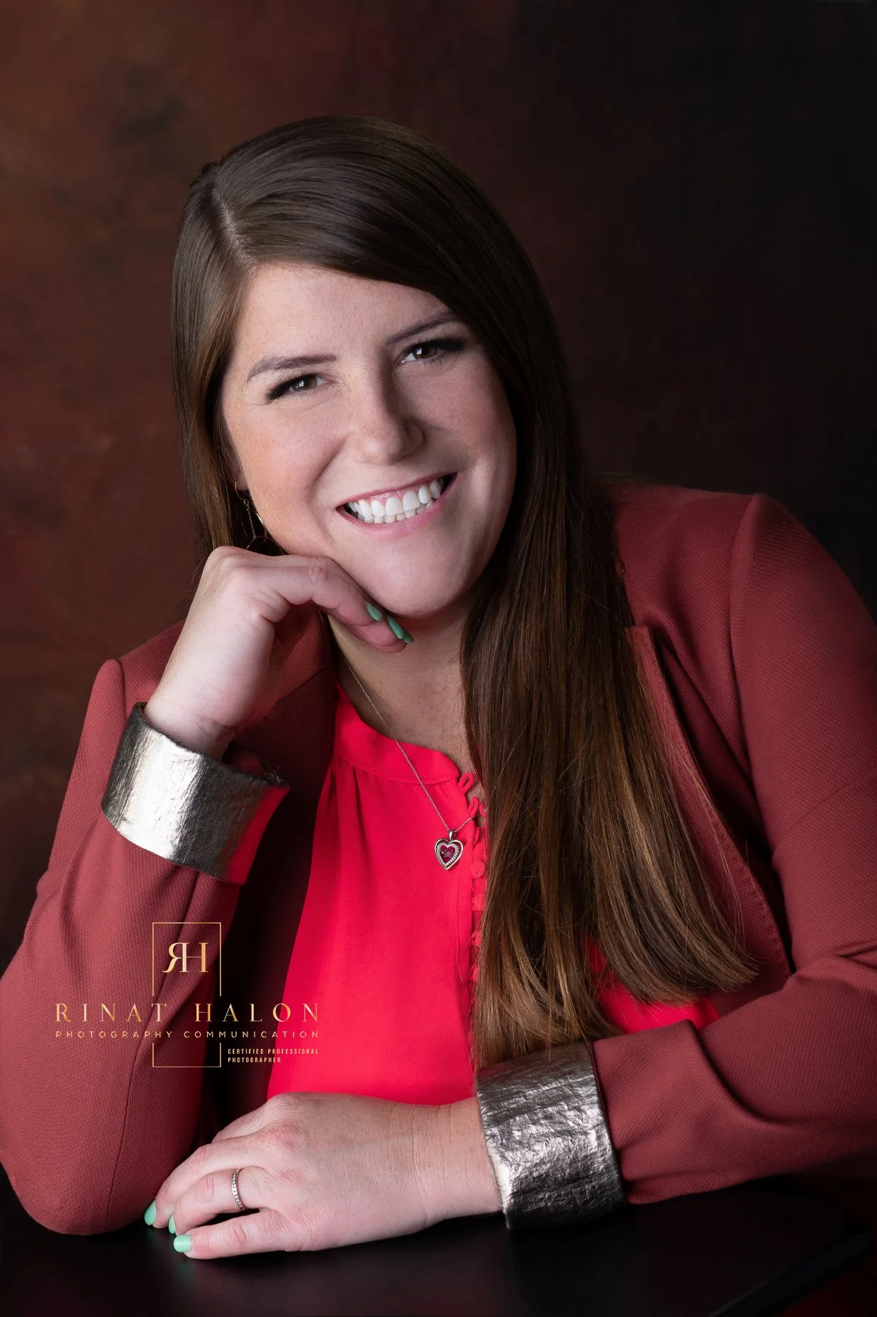 Pro Headshot woman posing seated