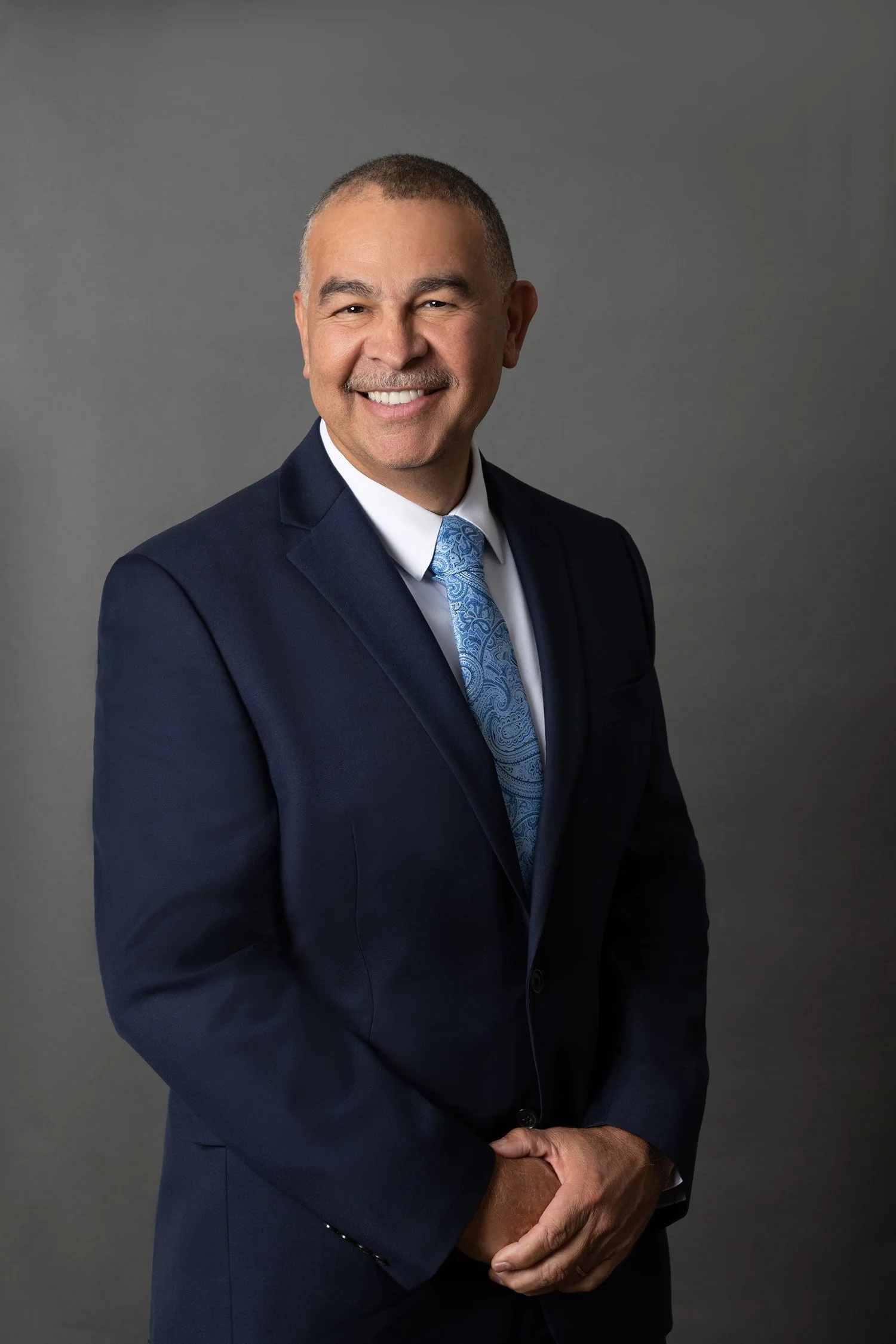 Winter Park Headshot Photographer Rinat Halon professional man in business attire portrait